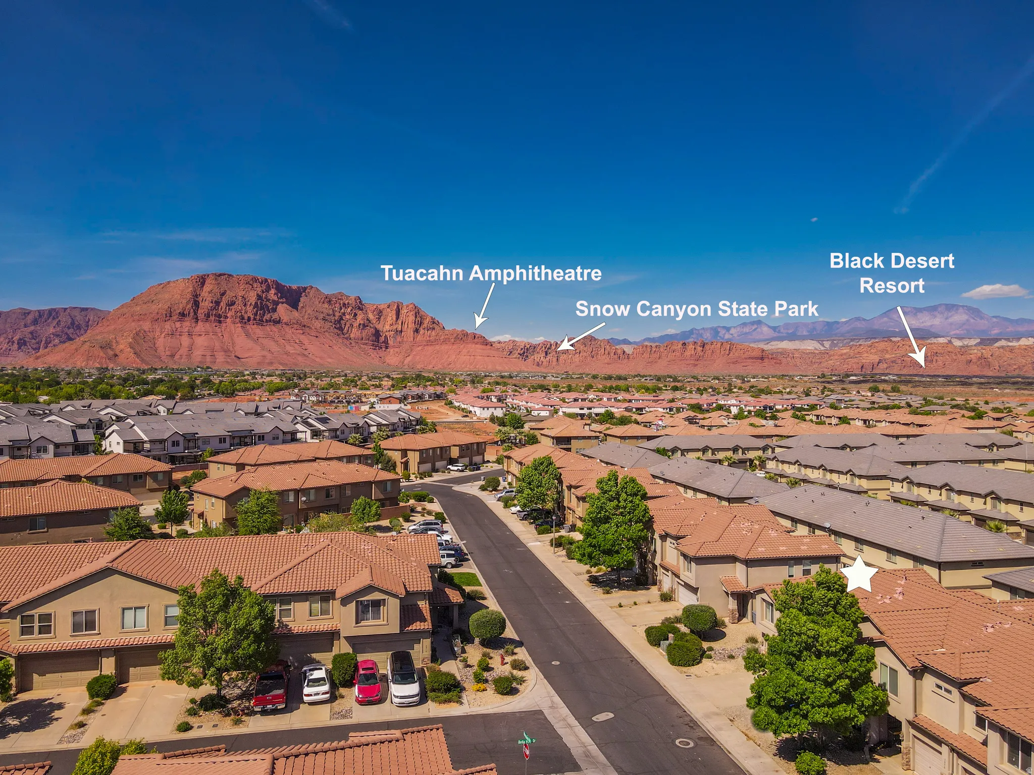 Aerial view of residential area with mountains