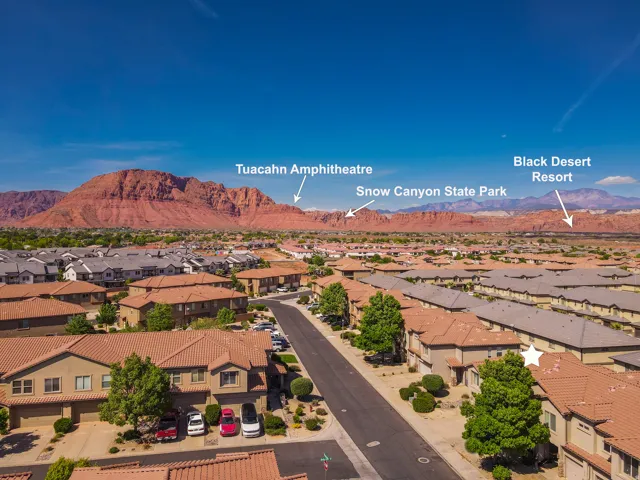 Aerial view of residential area with mountains
