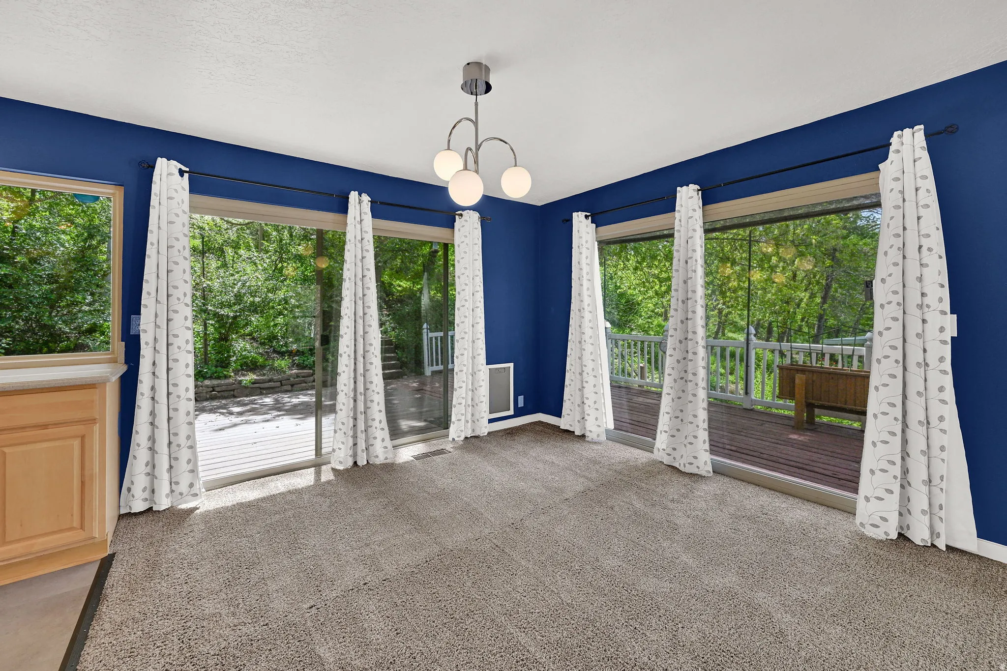Exterior deck wraps around dining room