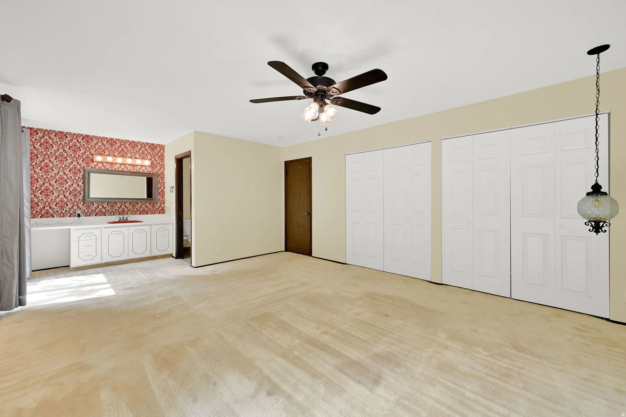 Primary bedroom and bath with retro touches