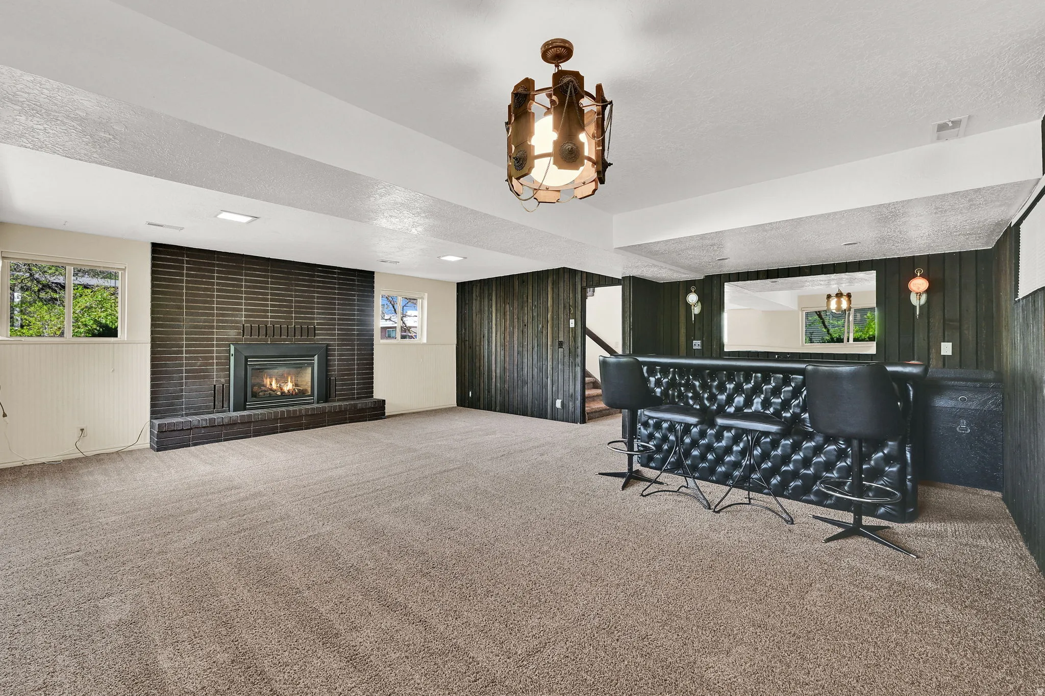 Family room down with gas fireplace and wet bar
