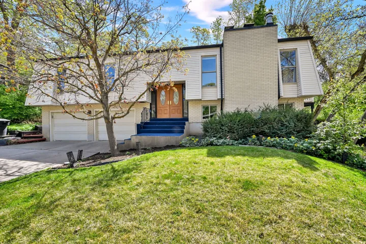 Charming Fruit Heights home on wooded lot