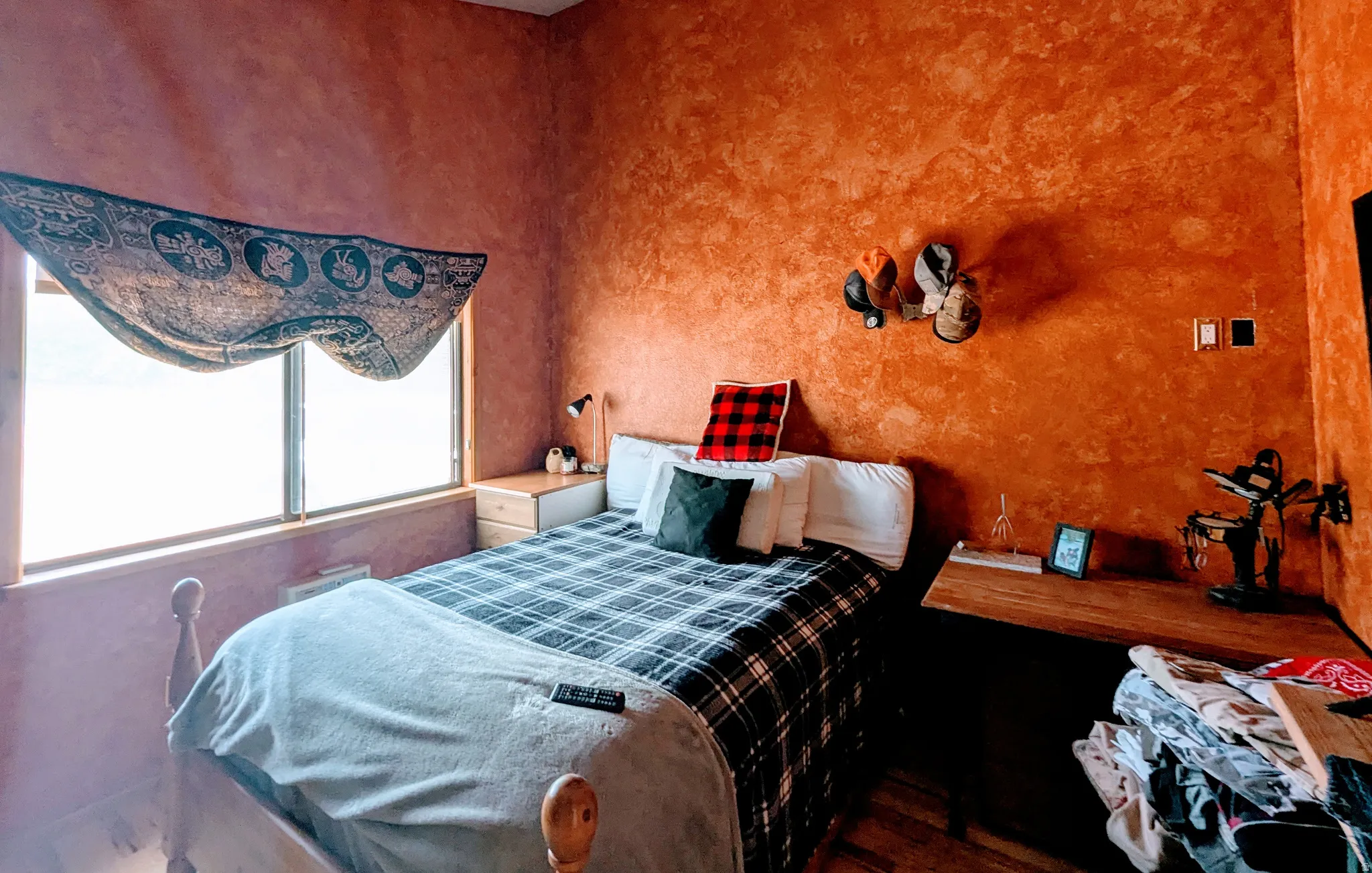 Bedroom with dark wood-type flooring