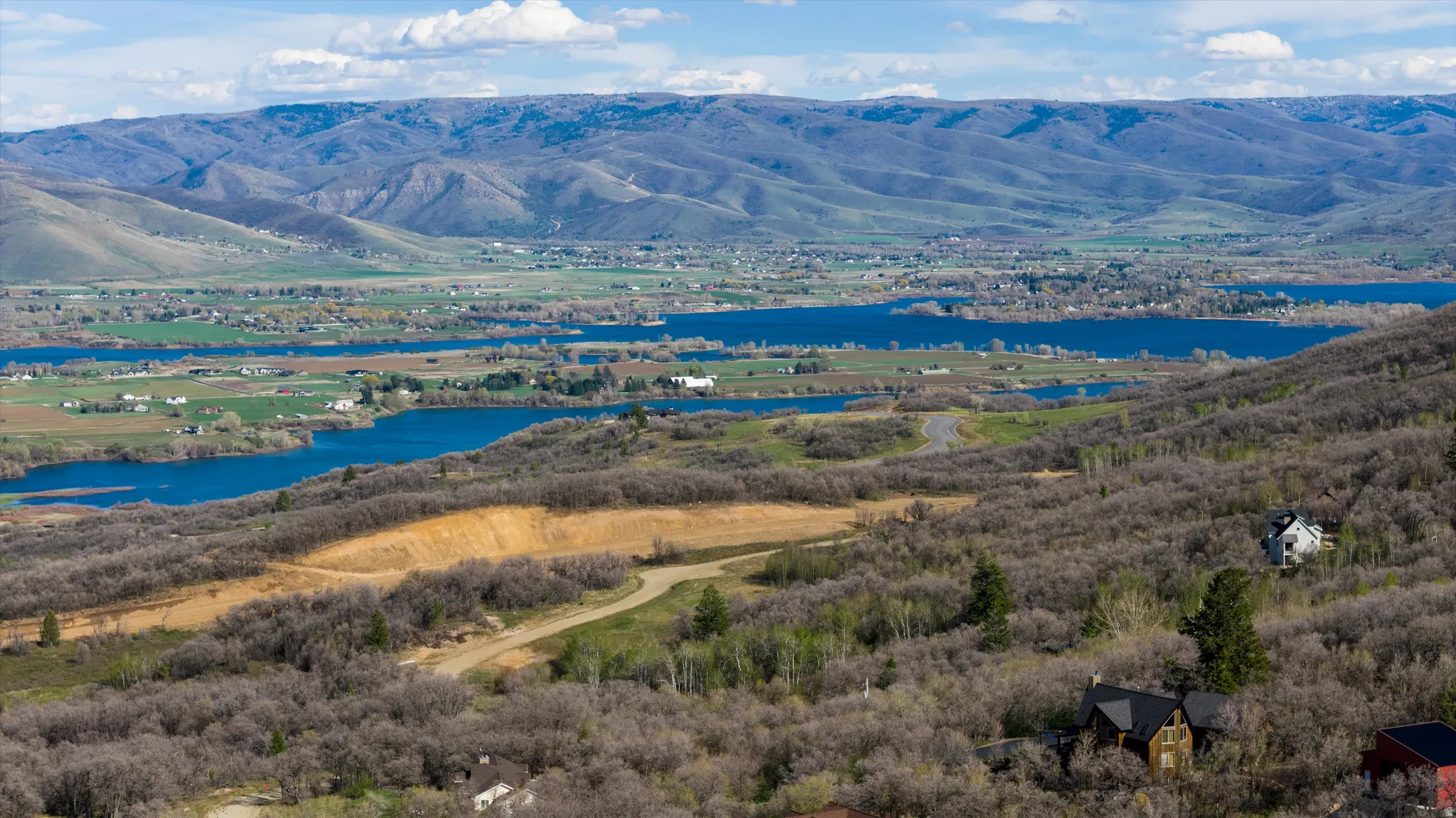 View of mountain background with a nearby body of water