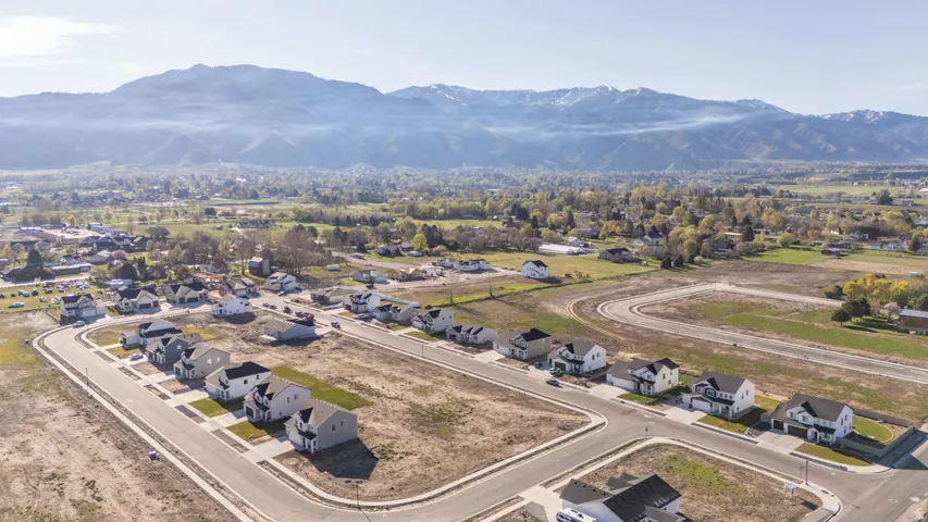 Aerial view of residential area with a mountainous background