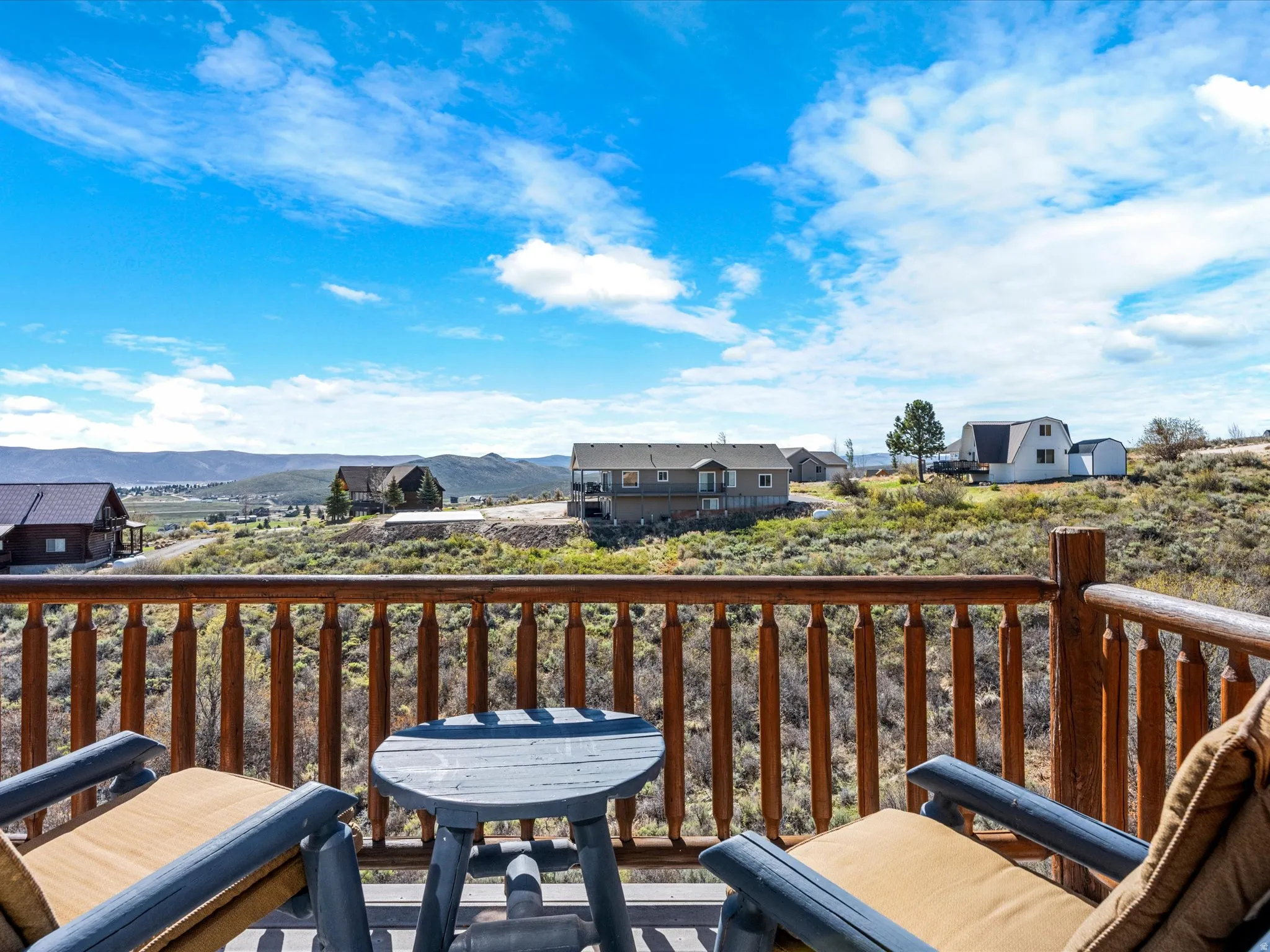 Balcony with a mountain view and a residential view