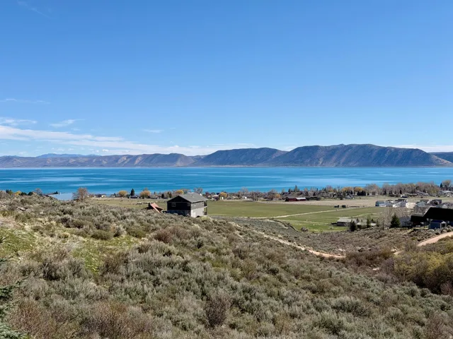 View of mountain backdrop with a nearby body of water