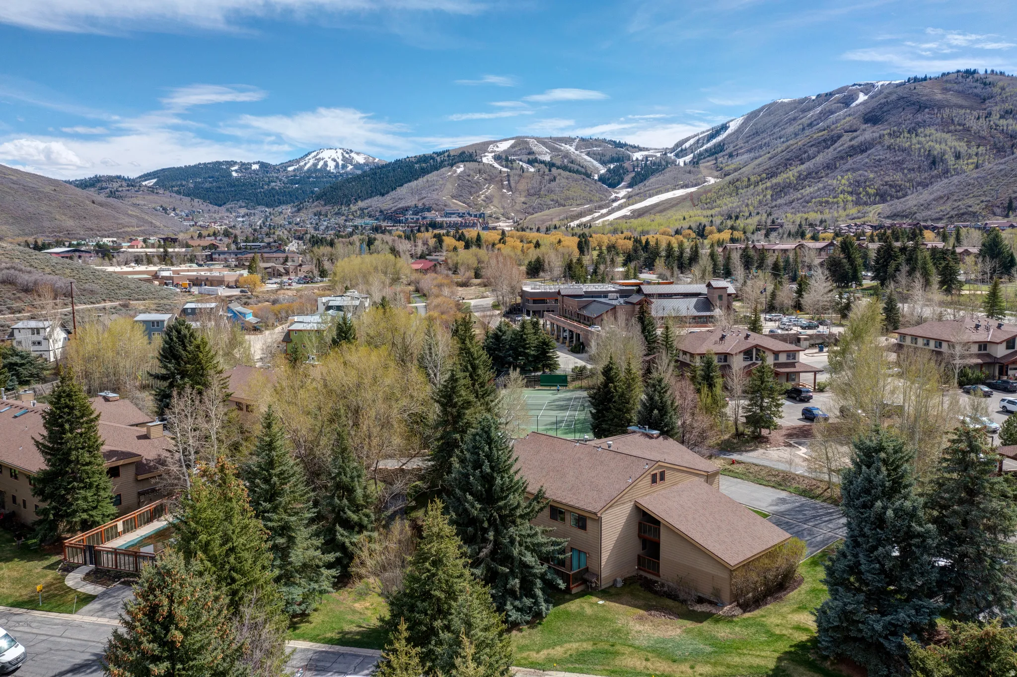 View of mountain backdrop featuring nearby suburban area