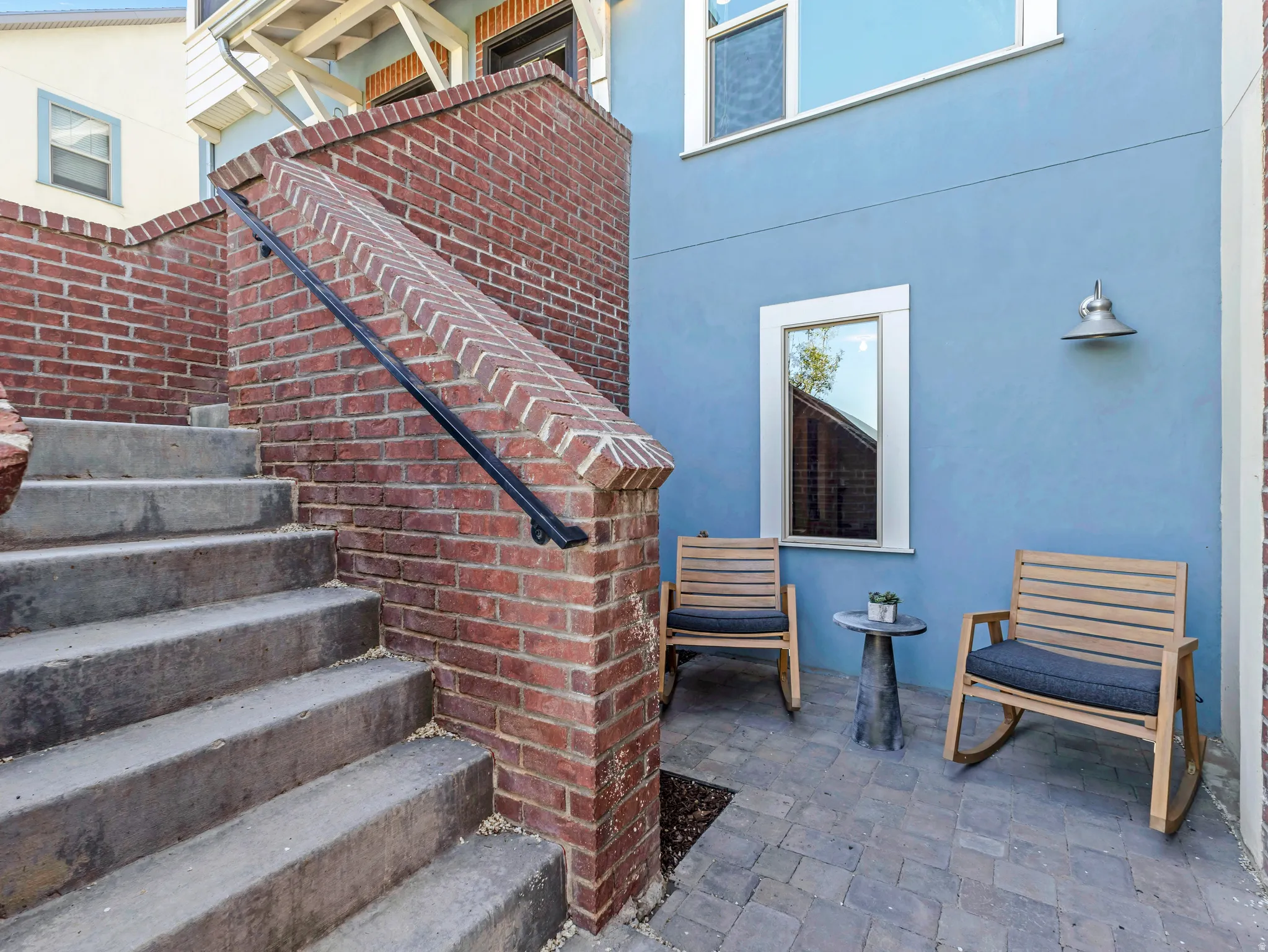 View of staircase and courtyard porch