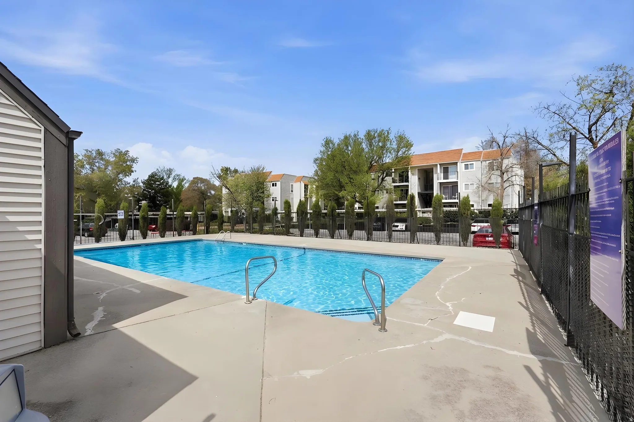 Community pool featuring a patio area