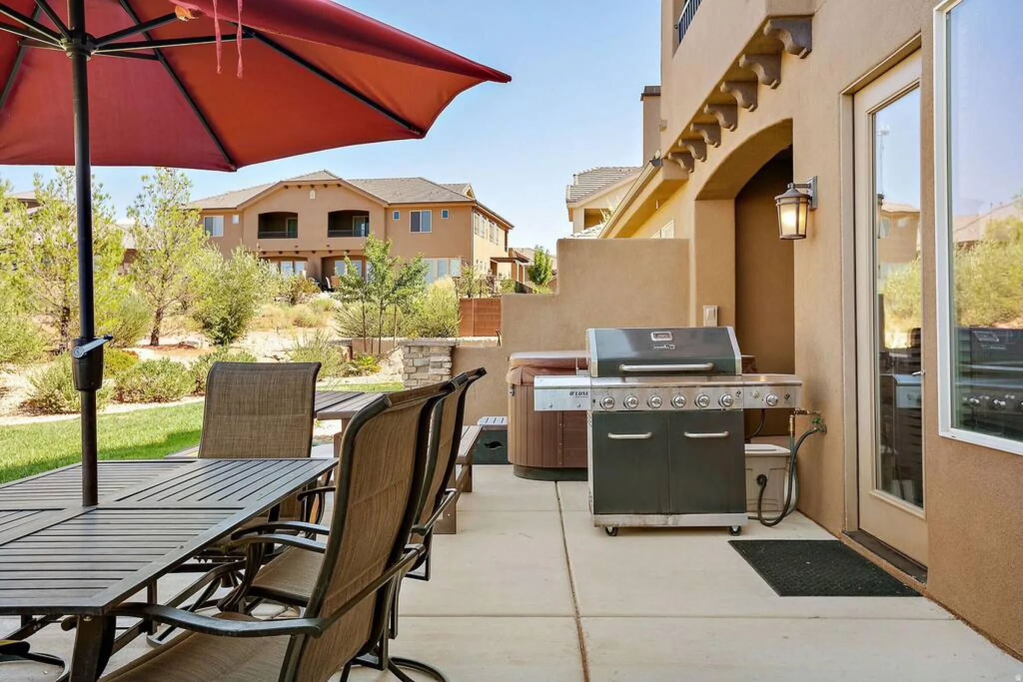 View of patio / terrace featuring outdoor dining space and grilling area