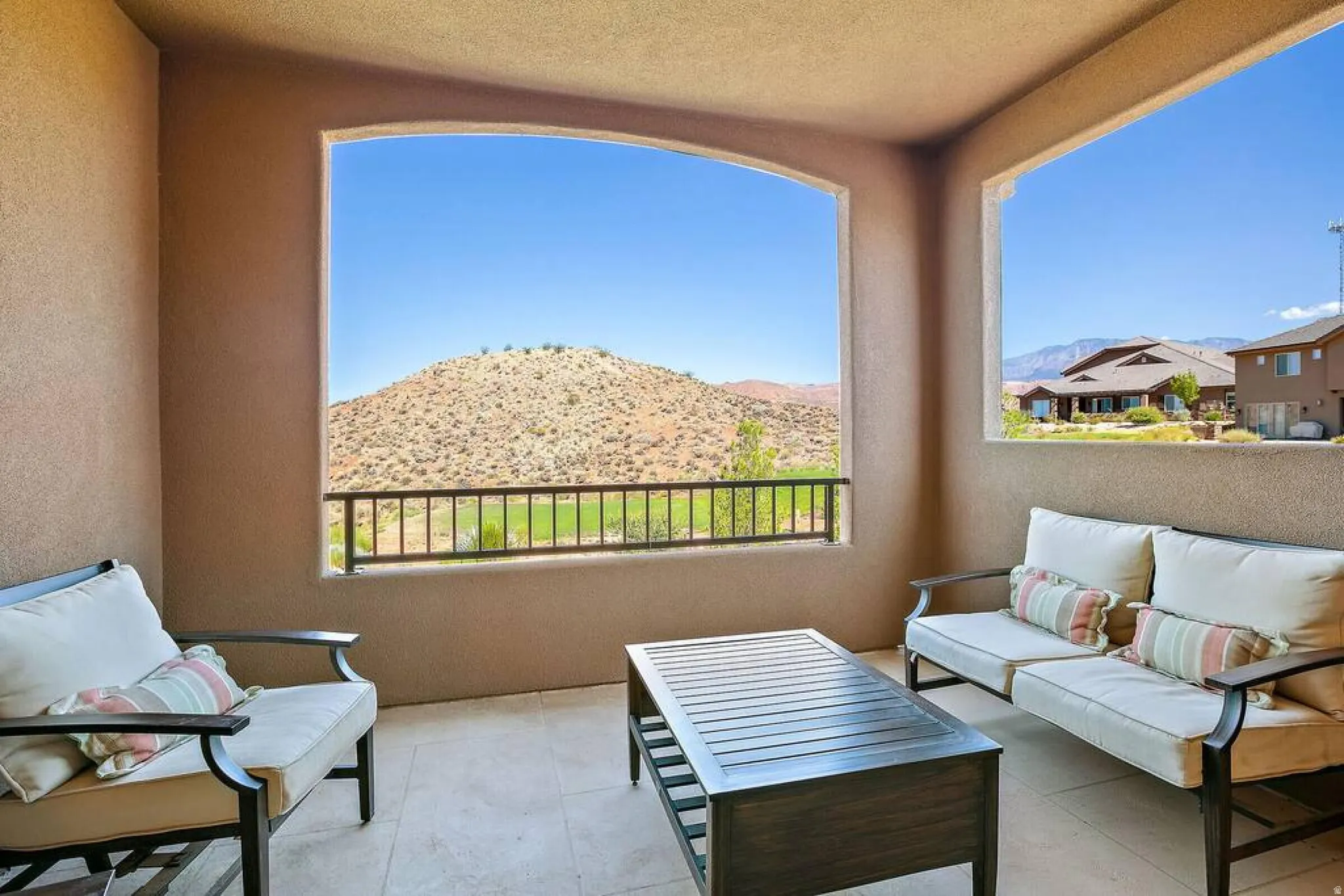 Balcony featuring a mountain view and an outdoor lounge area