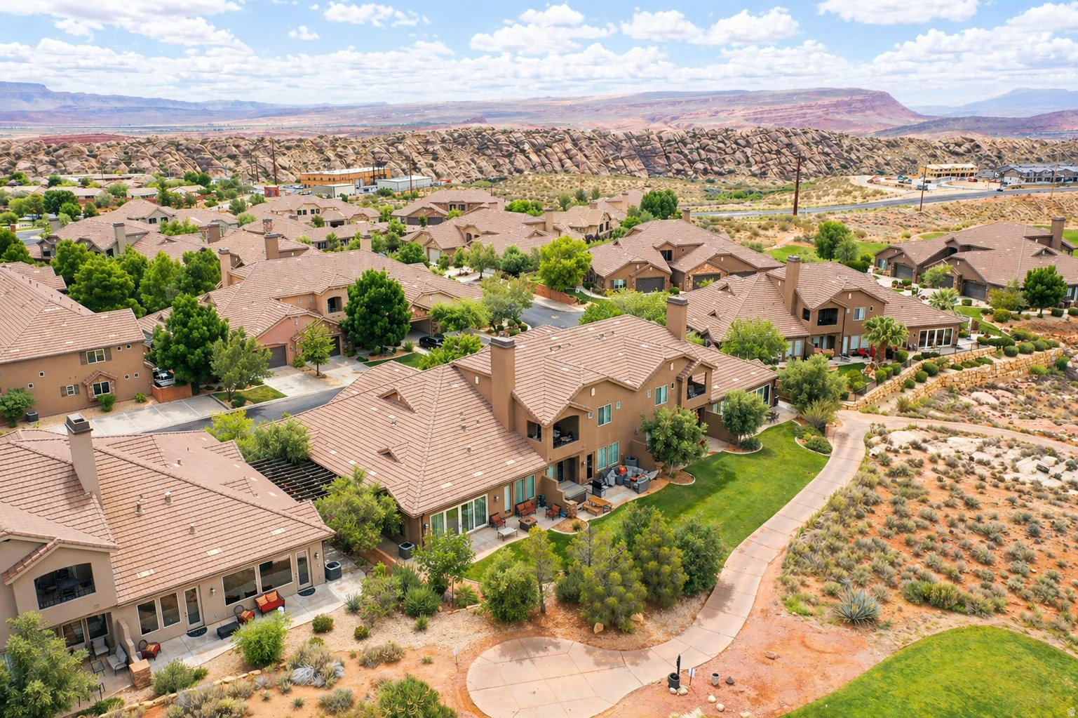 Aerial view of residential area with a mountain backdrop