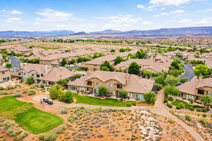 Aerial perspective of suburban area with mountains