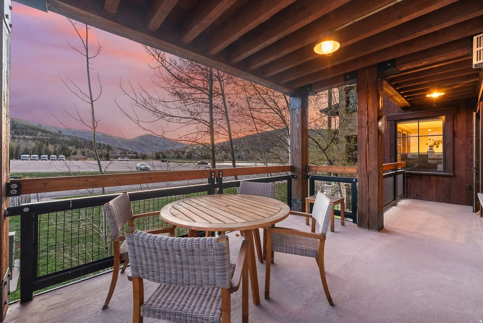 View of patio featuring a mountain view and outdoor dining space