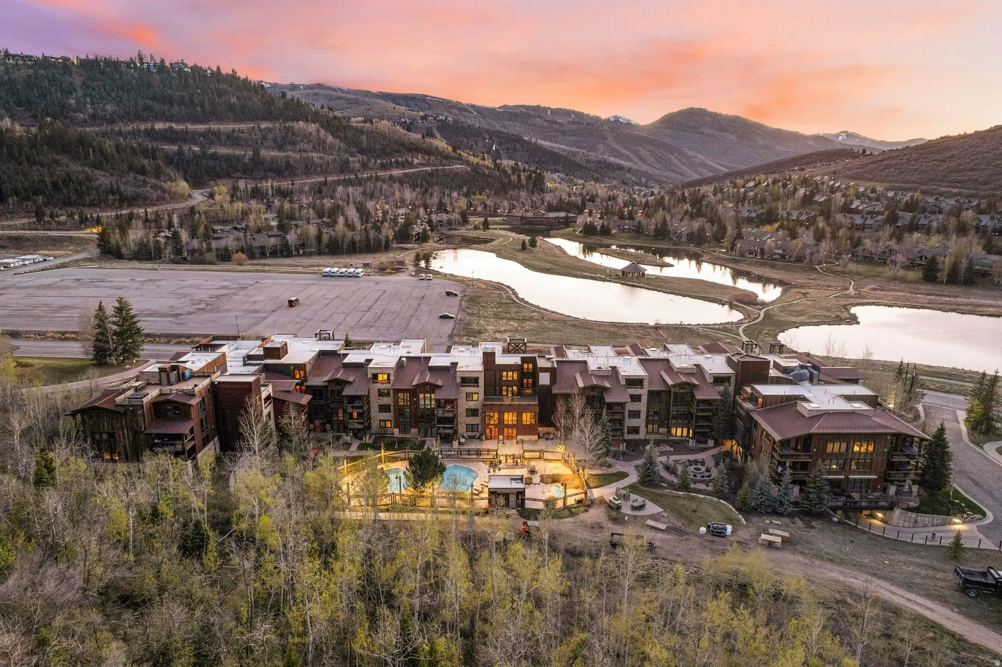 Aerial view at dusk of a water and mountain view