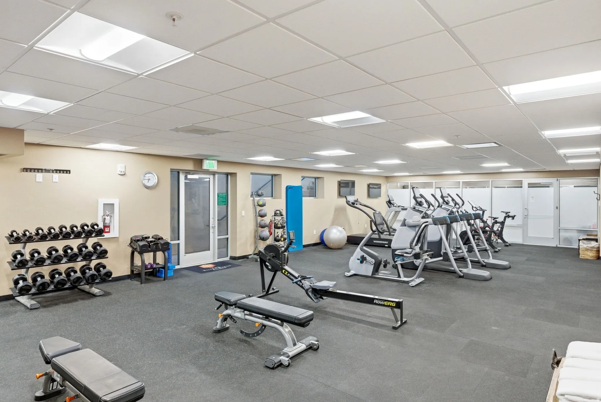 Exercise room with a paneled ceiling