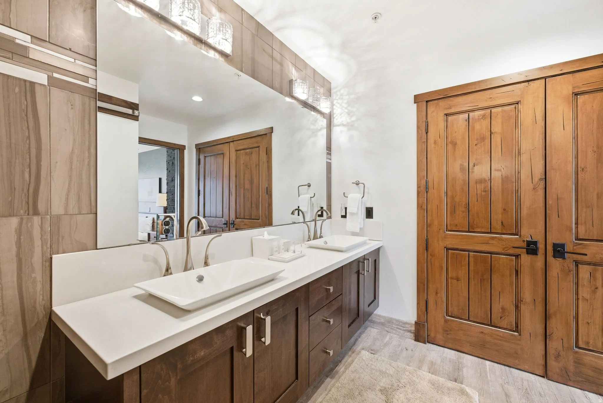 Bathroom featuring double vanity and recessed lighting