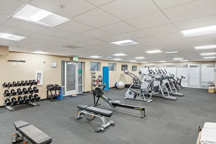 Exercise room with a paneled ceiling