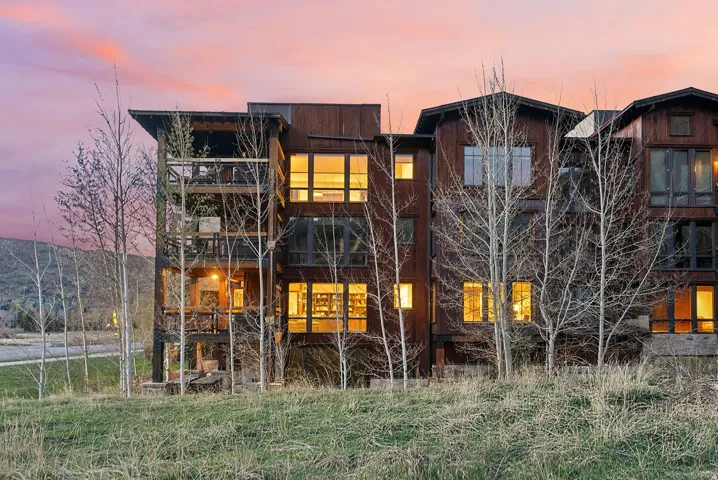 Rear view of property featuring a balcony