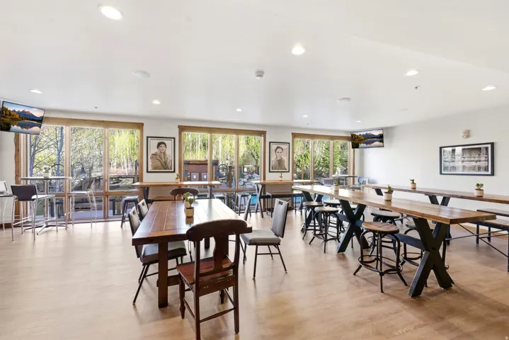 Dining area featuring light wood-style flooring and recessed lighting