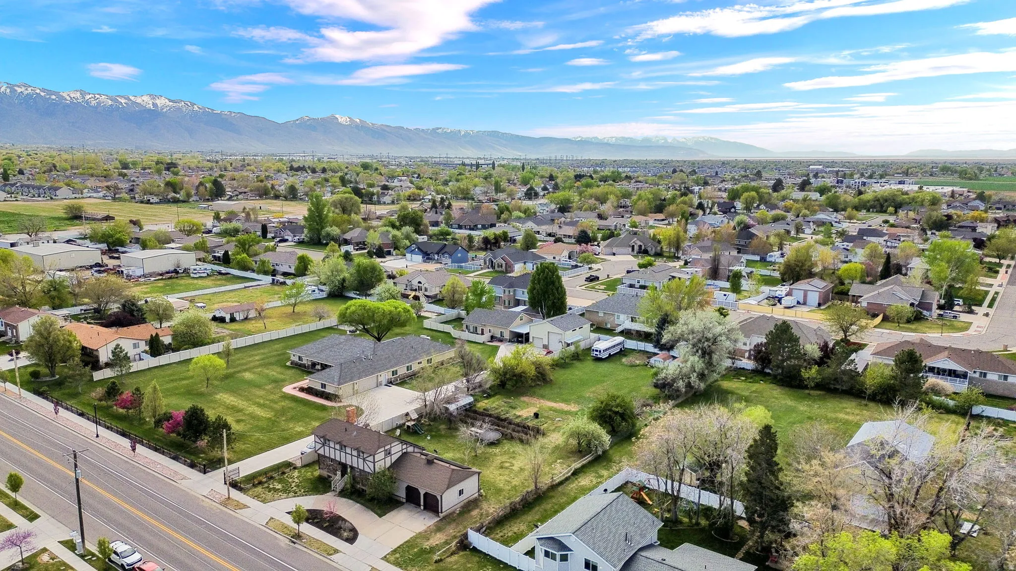 Aerial view of residential area with a mountainous background