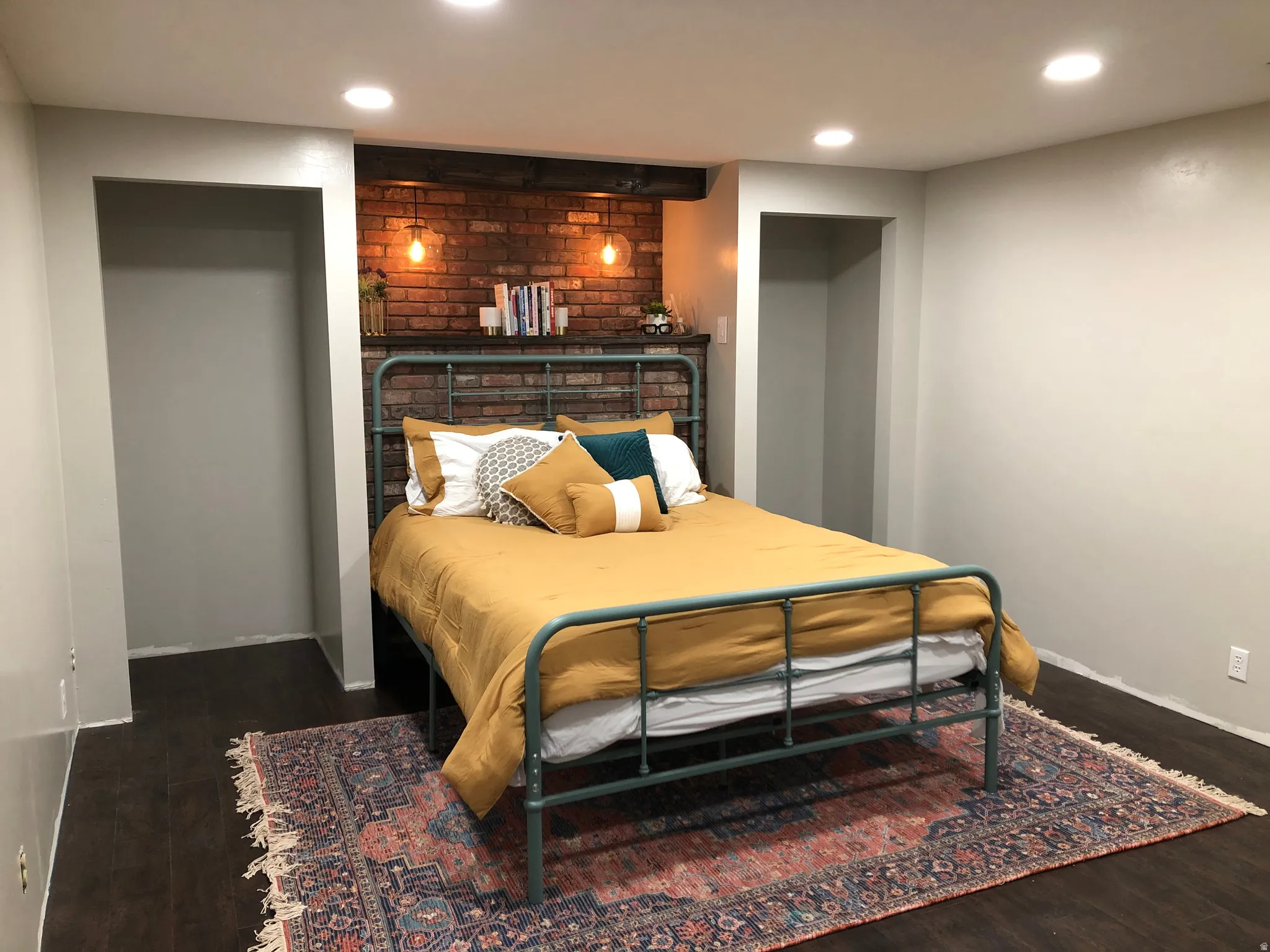 Bedroom with dark wood-type flooring and recessed lighting