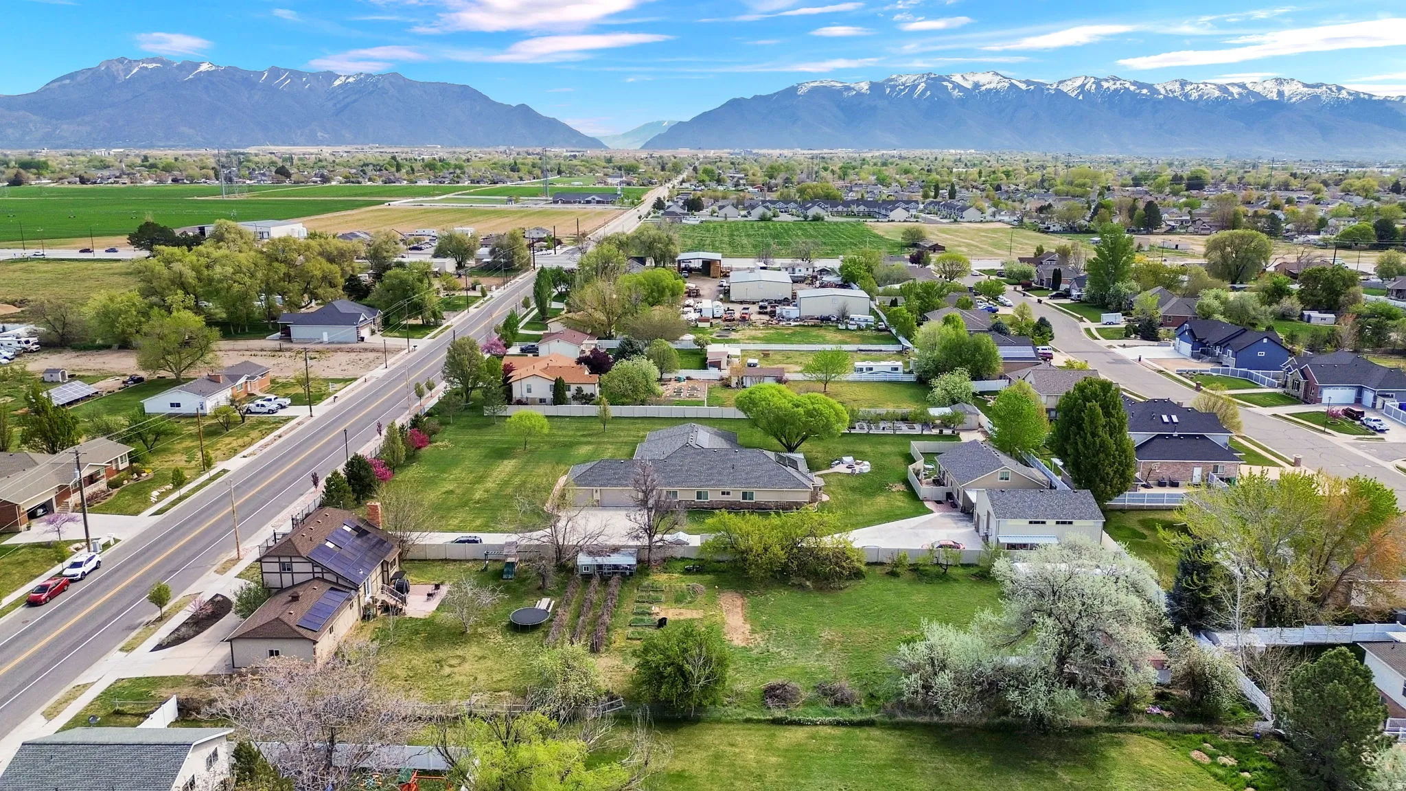 Aerial perspective of suburban area featuring mountains
