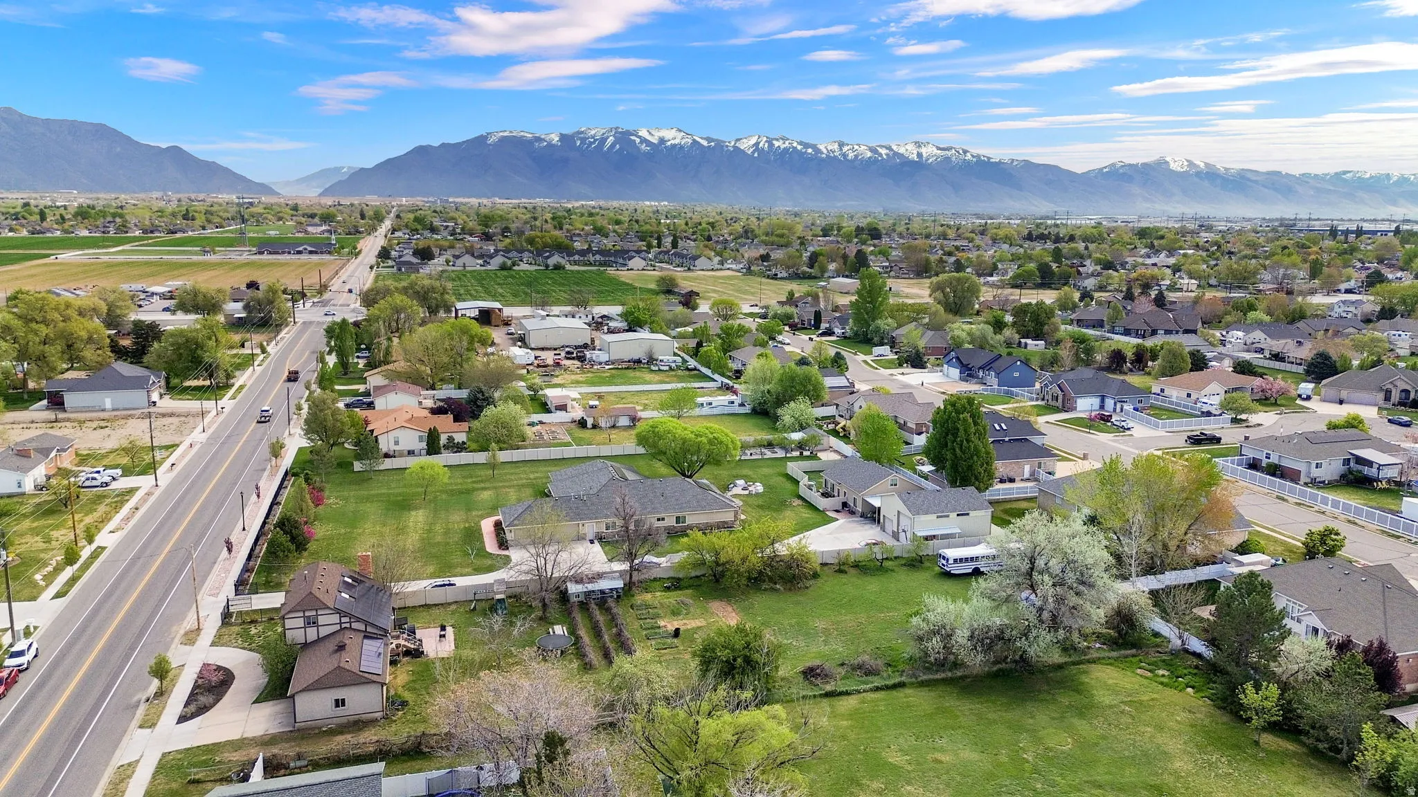 Aerial view of residential area featuring a mountain backdrop