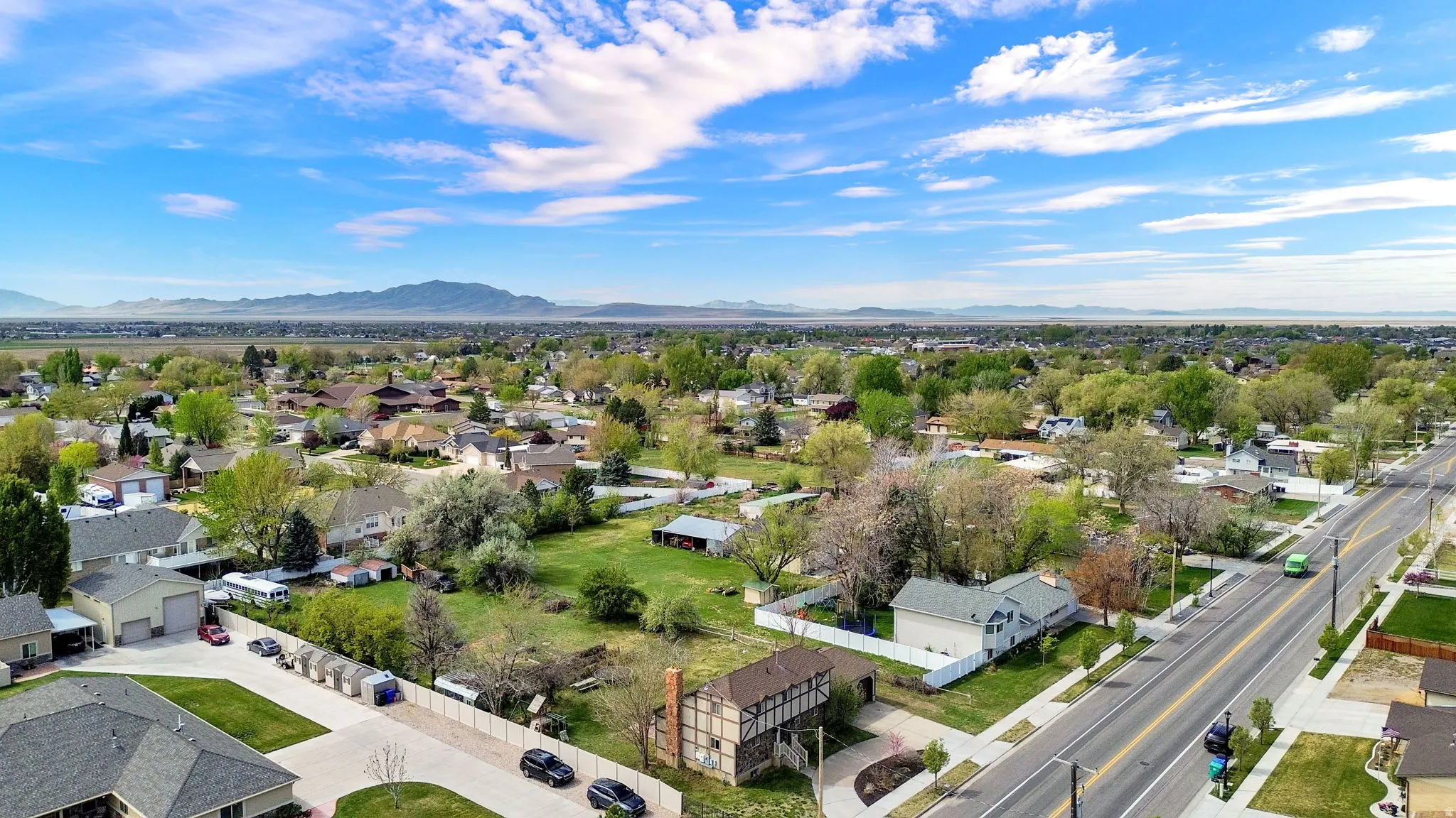 Aerial perspective of suburban area featuring mountains