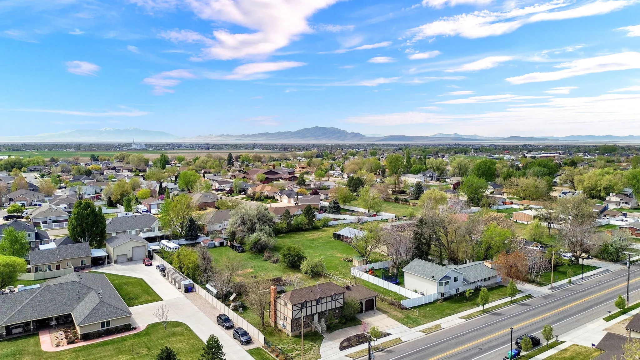 Aerial view of residential area with a mountain backdrop