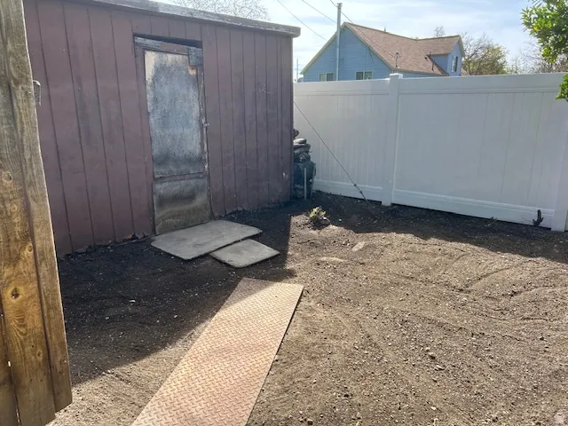 View of yard with a shed