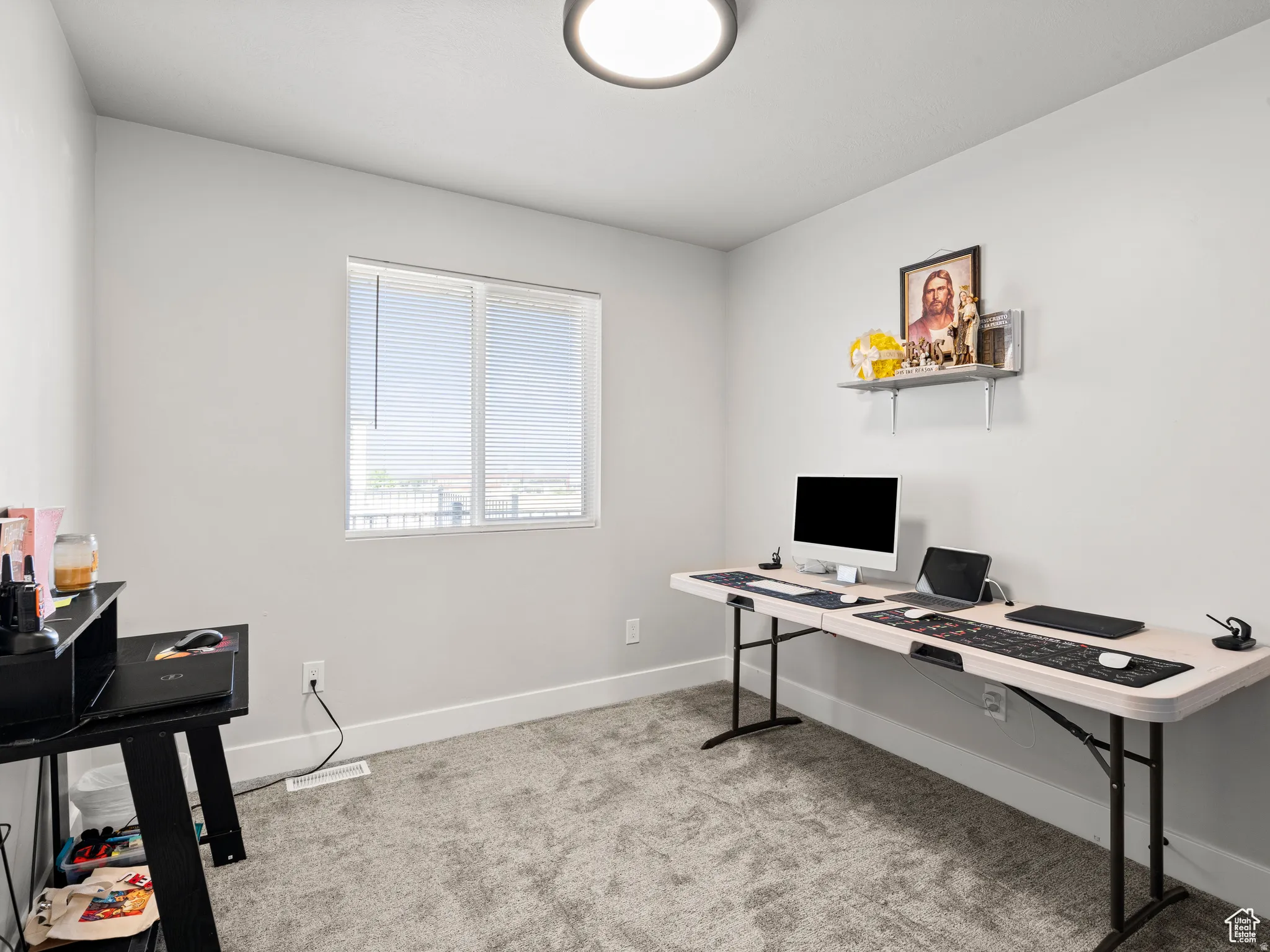 Office space or bedroom 3 featuring light carpet and baseboards