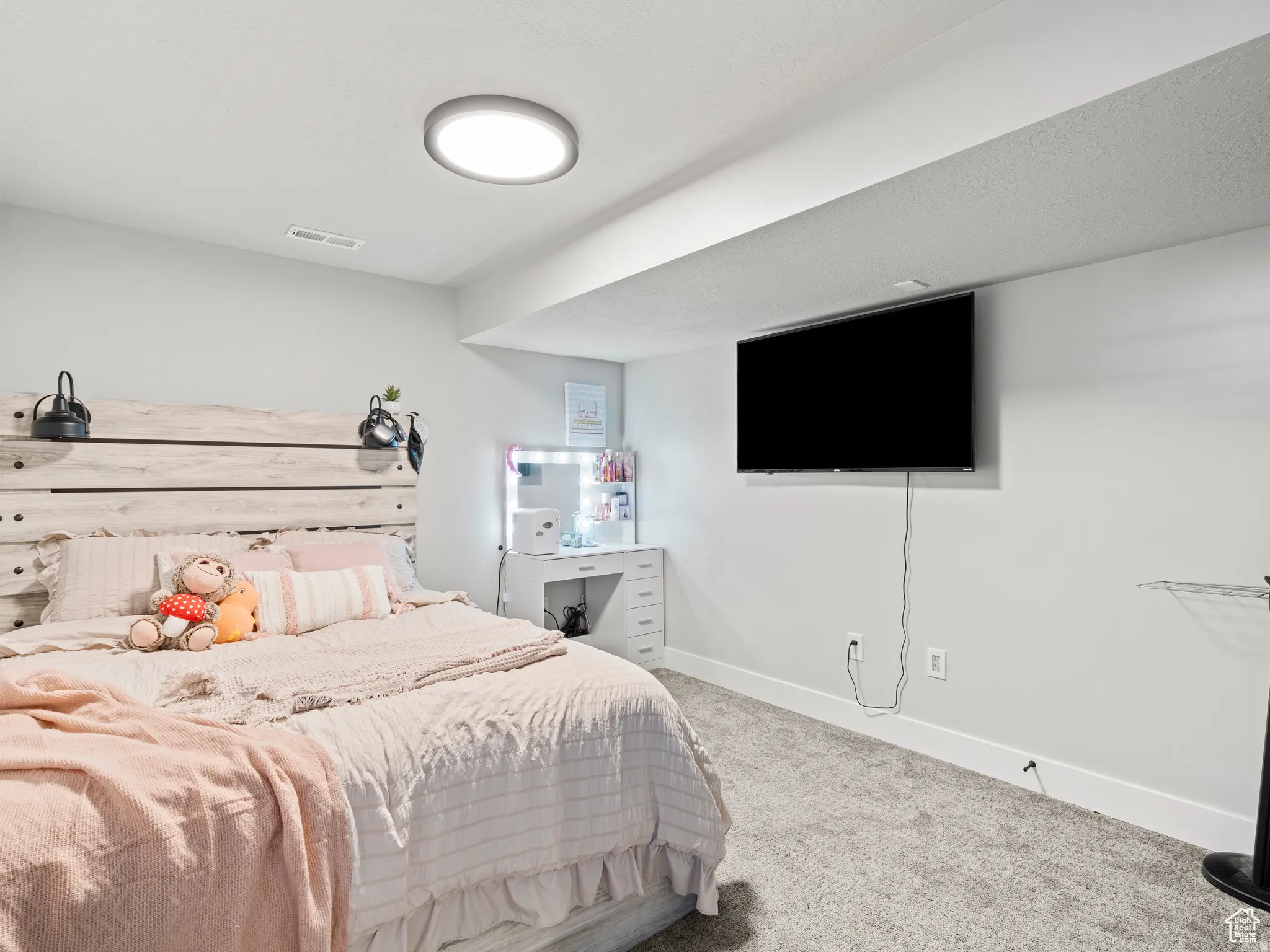 Carpeted bedroom 4 featuring baseboards