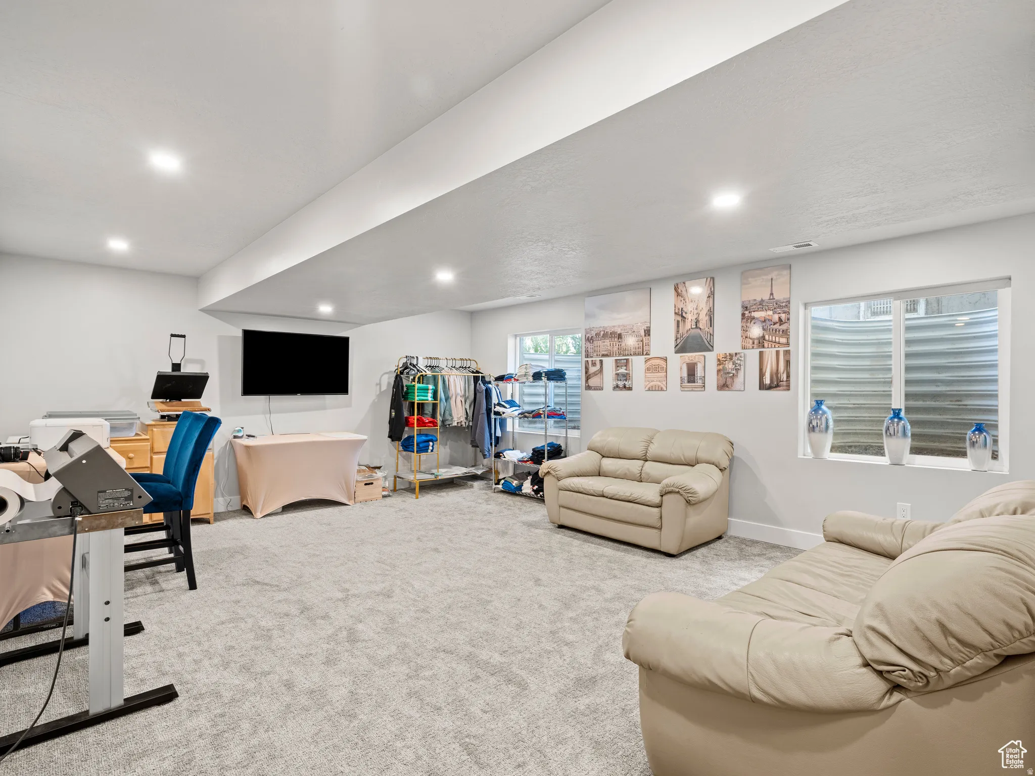 Living room with carpet floors and recessed lighting