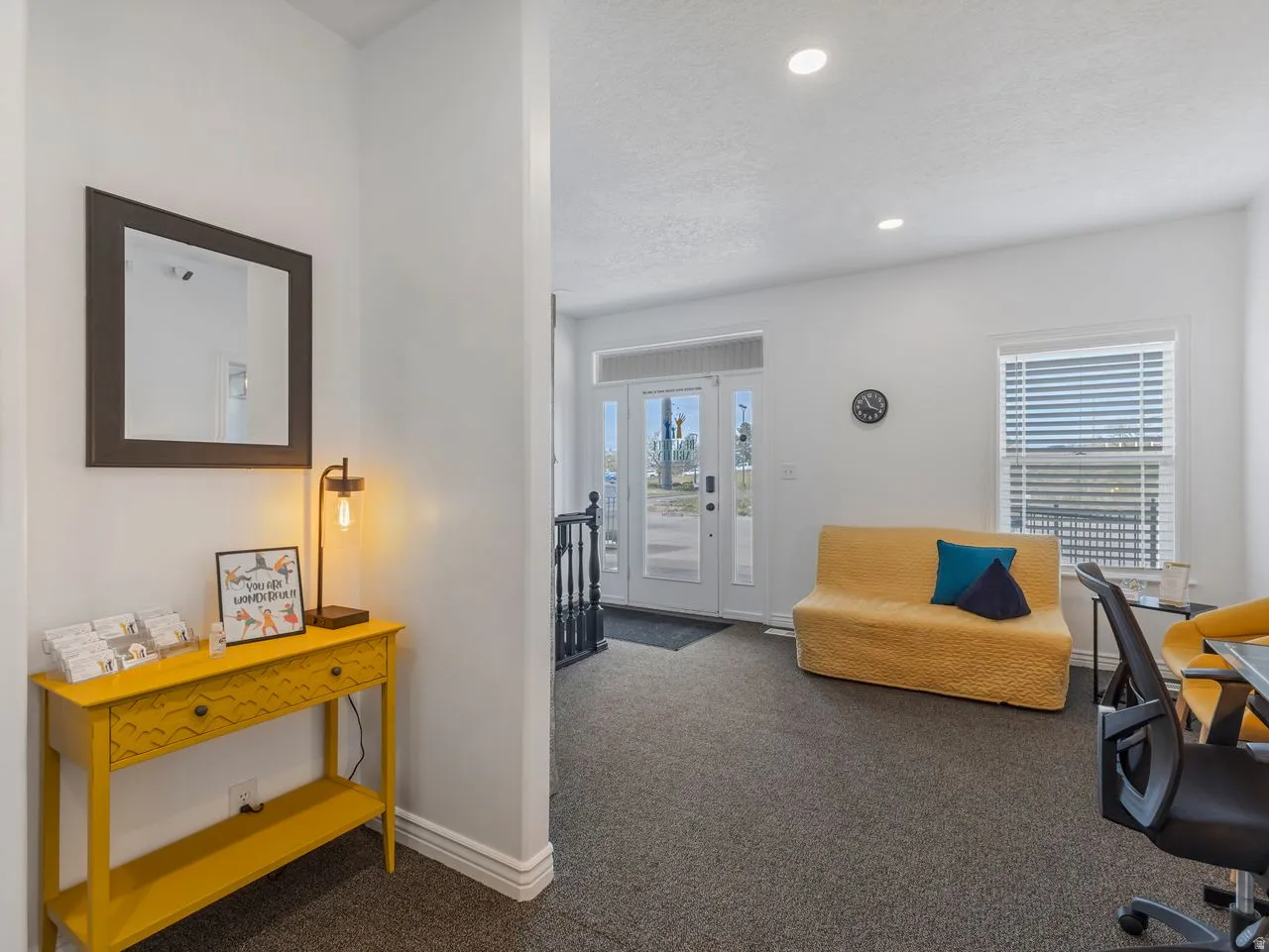 Carpeted home office featuring recessed lighting and a textured ceiling