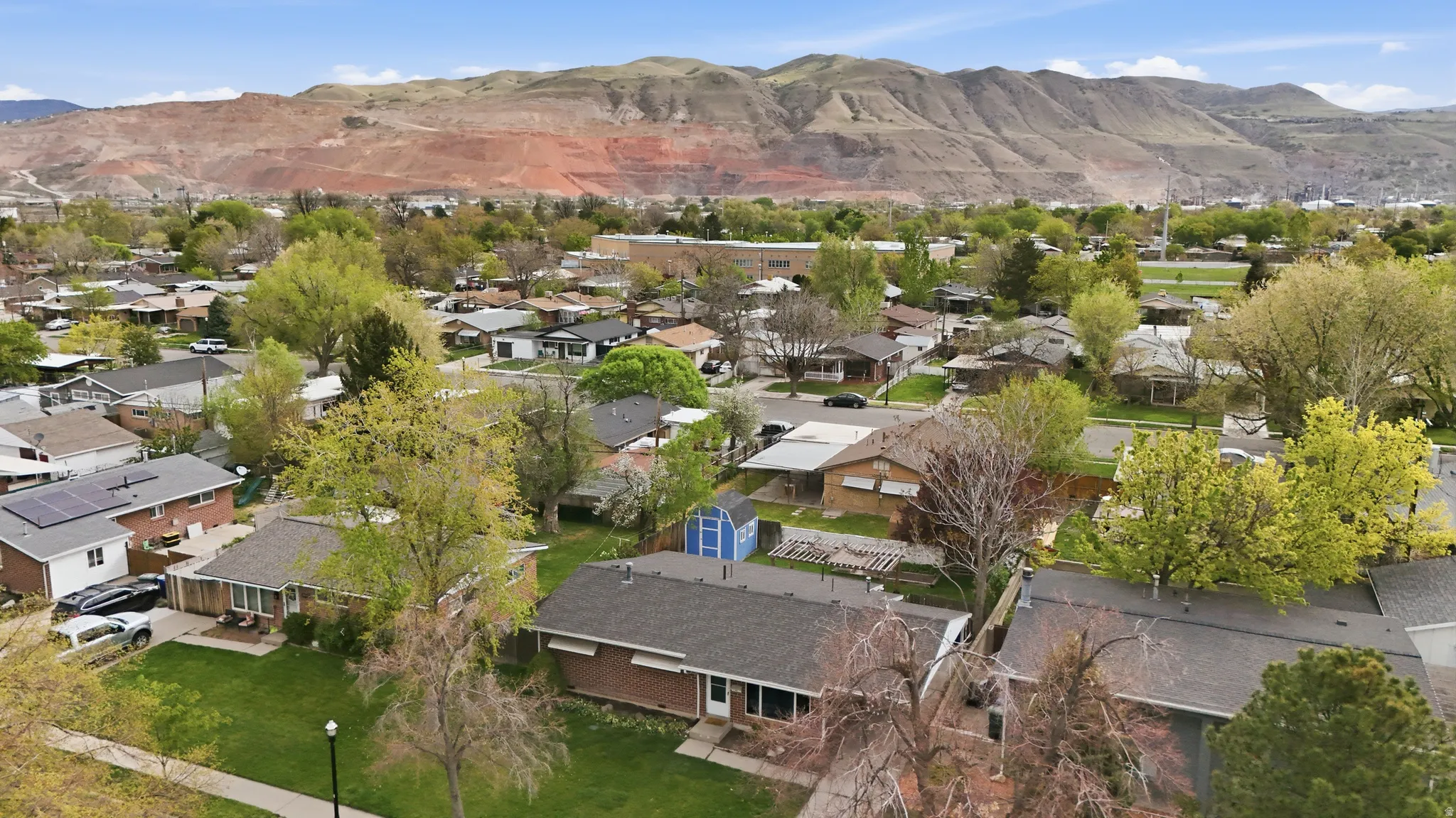 Aerial view of residential area with mountains