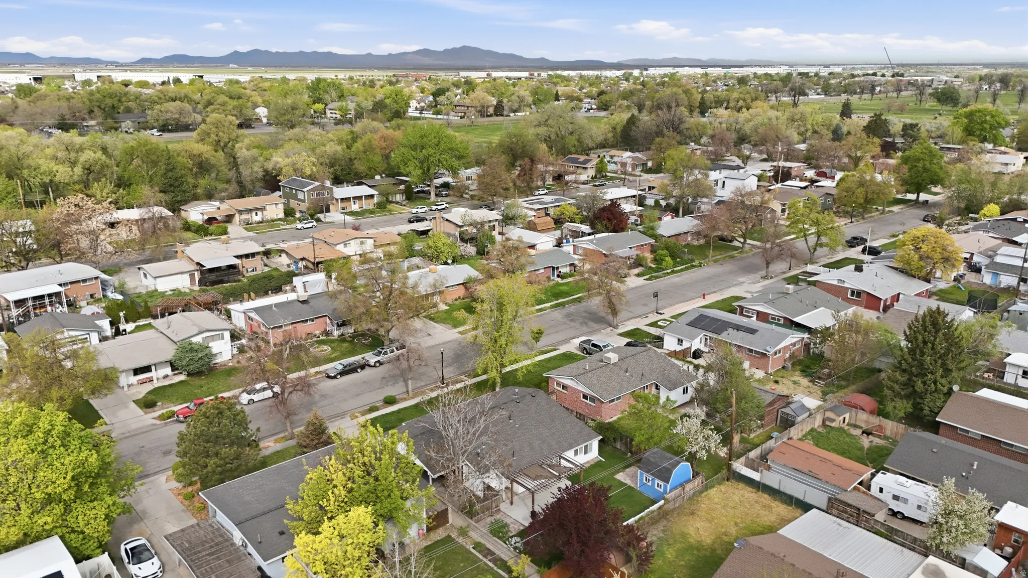 Aerial perspective of suburban area featuring mountains