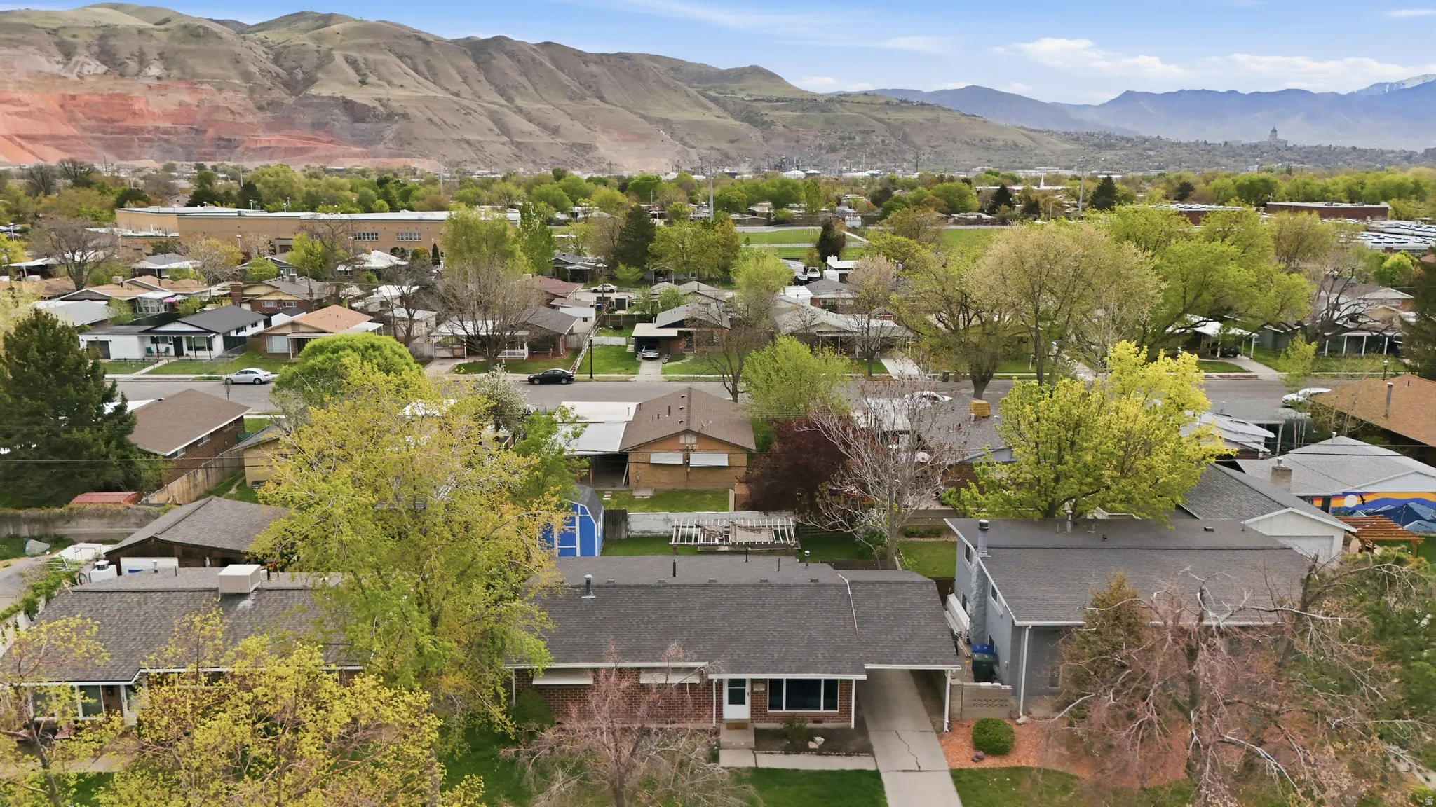 Aerial view of residential area with mountains