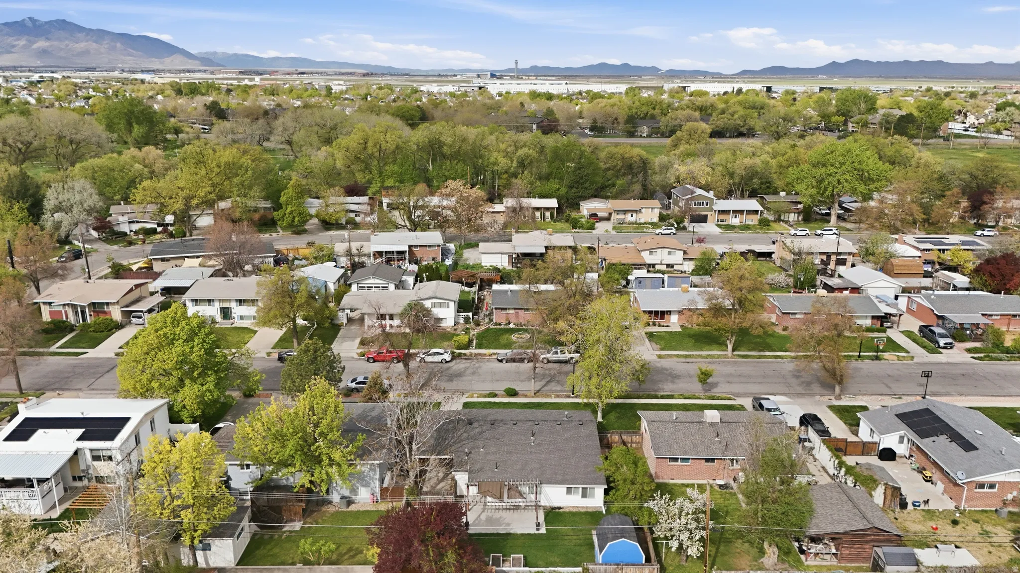 Aerial perspective of suburban area with mountains