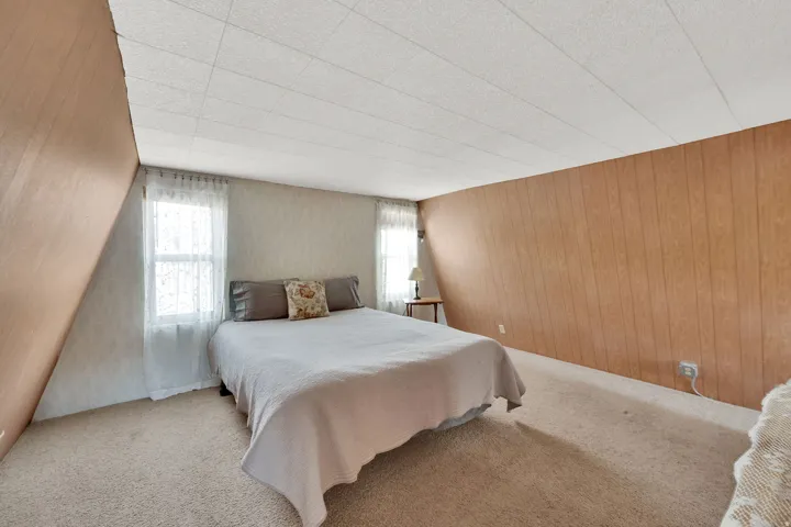 Bedroom with carpet flooring