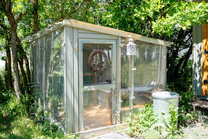 Freestanding outdoor structure featuring a sloped roof and wood-frame construction