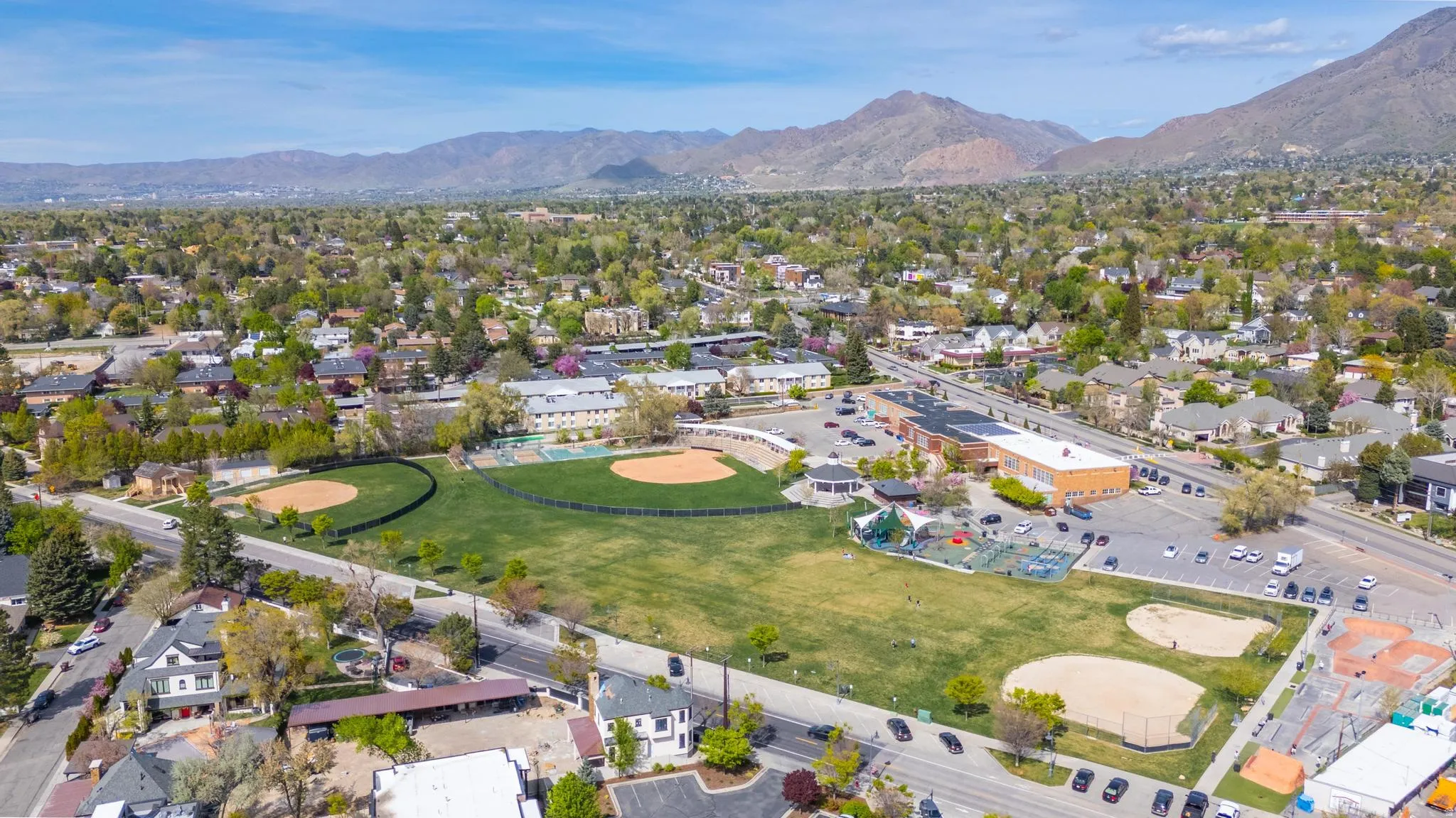 View of property location with nearby suburban area and a mountainous background