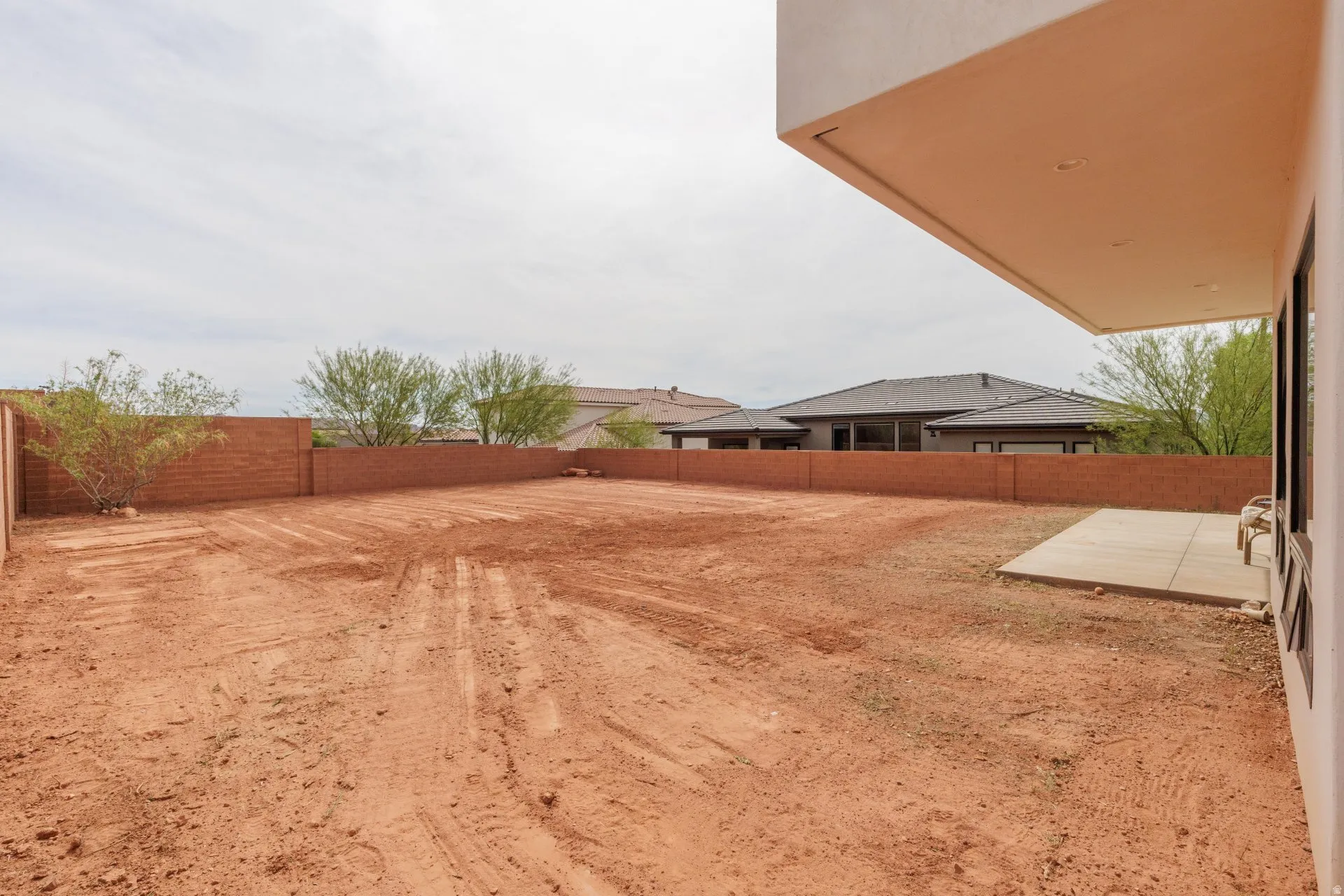 View of fenced backyard