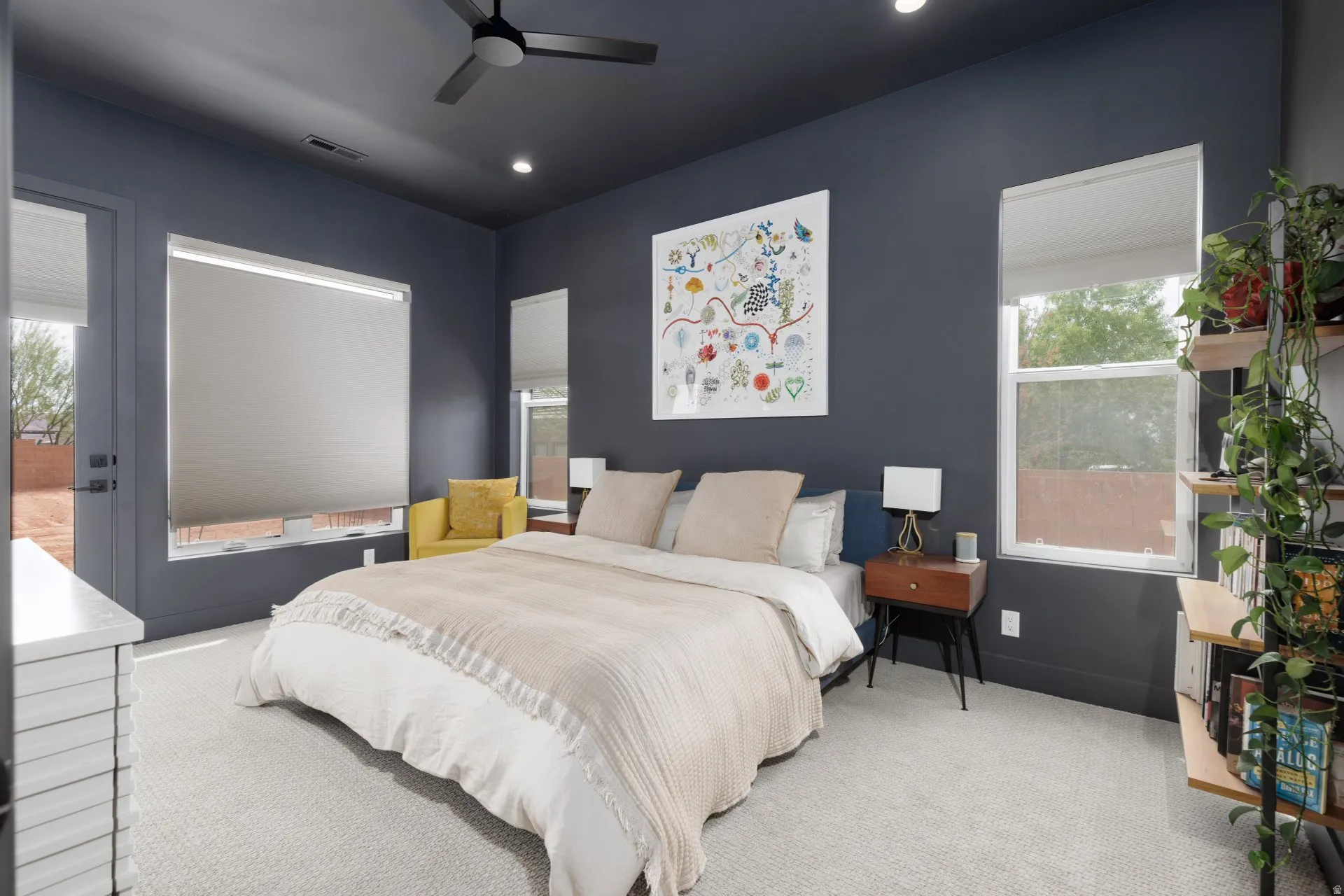 Carpeted bedroom featuring access to outside, ceiling fan, and recessed lighting