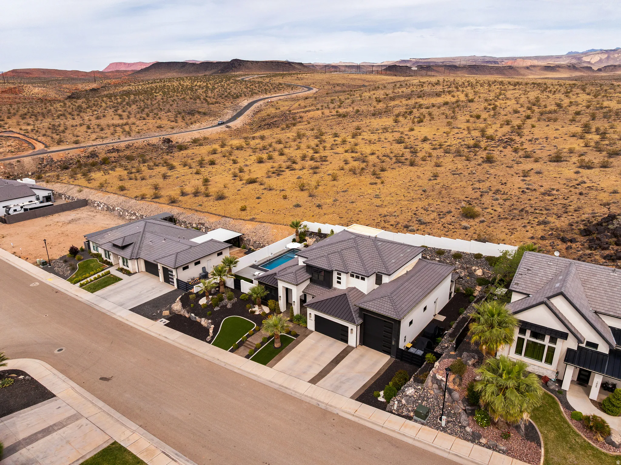 Aerial perspective of suburban area with mountains