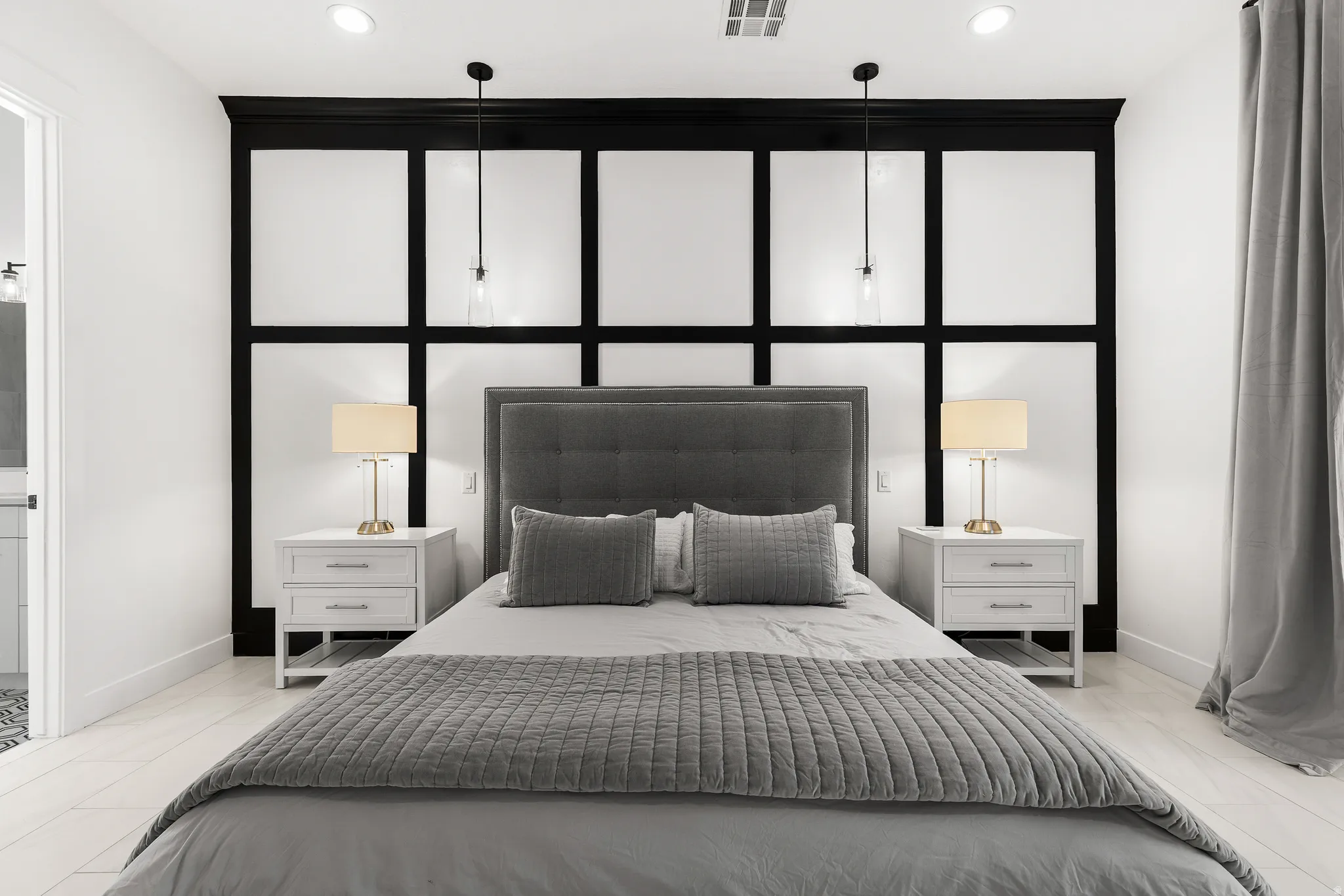 Bedroom with recessed lighting and baseboards