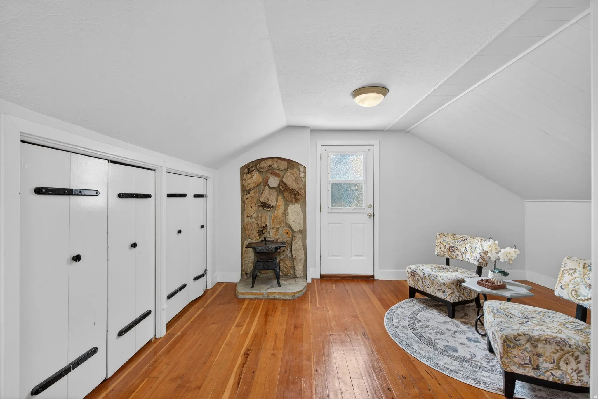 Living area with light wood-type flooring