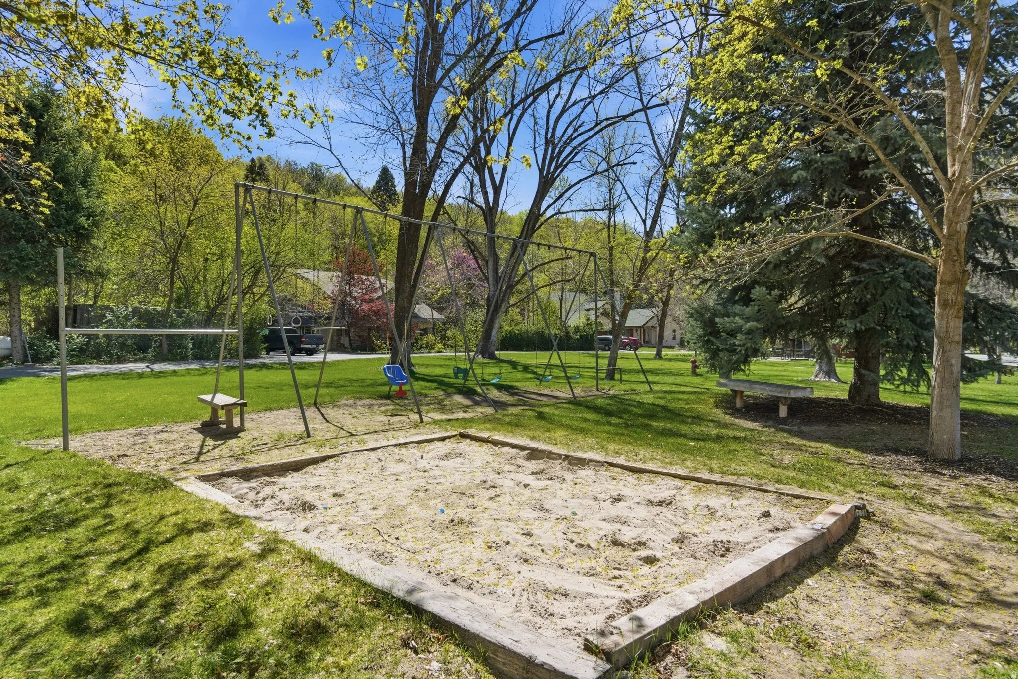 View of property's community with view of scattered trees