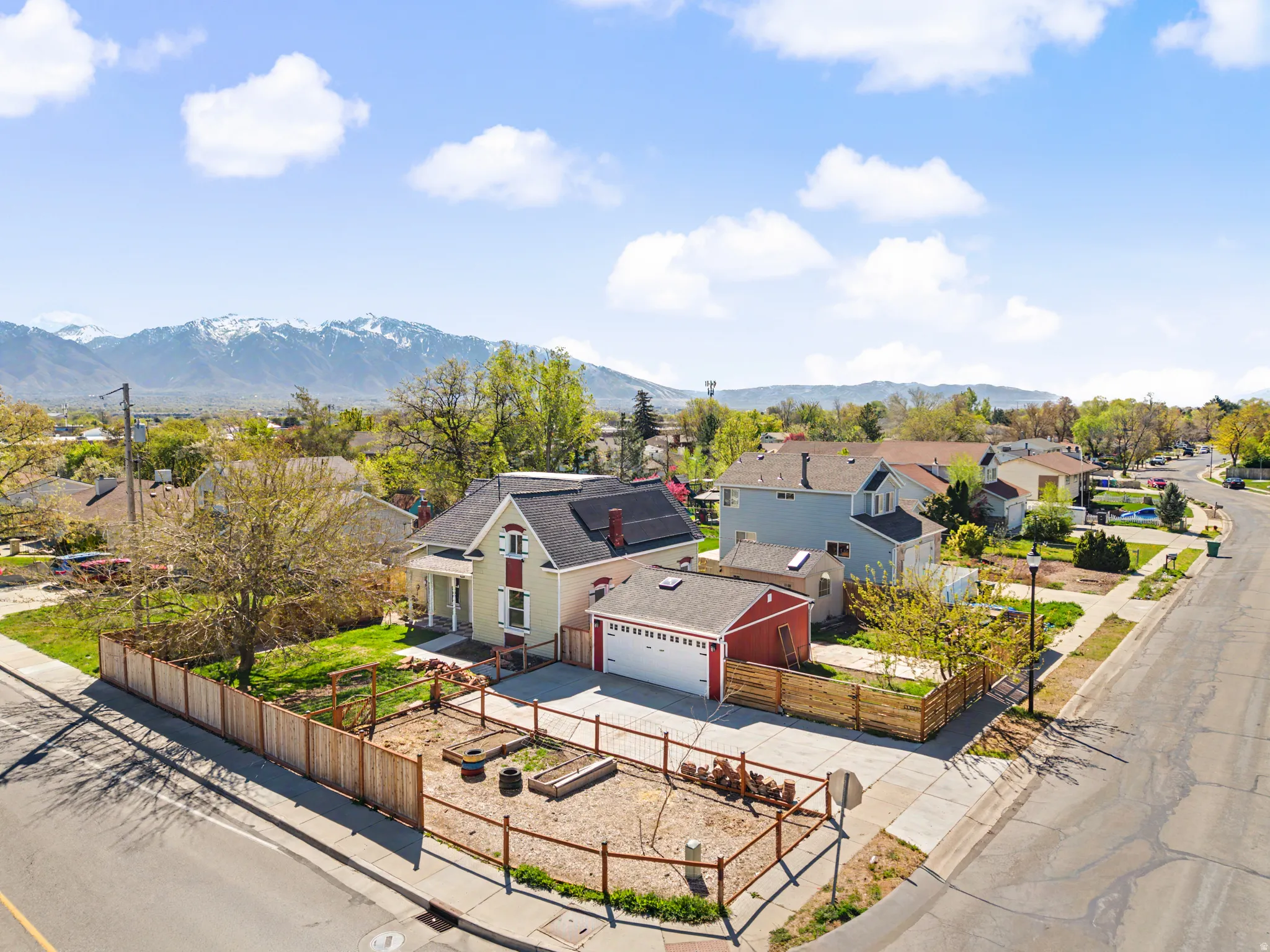 Aerial perspective of suburban area featuring mountains
